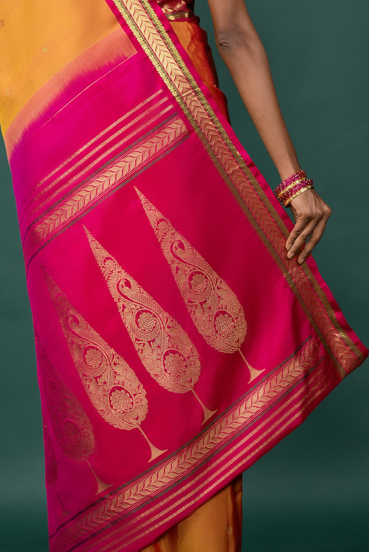Border image of Mustard Kanchipuram Silk Saree with Zari Butta on the body and Zari Border