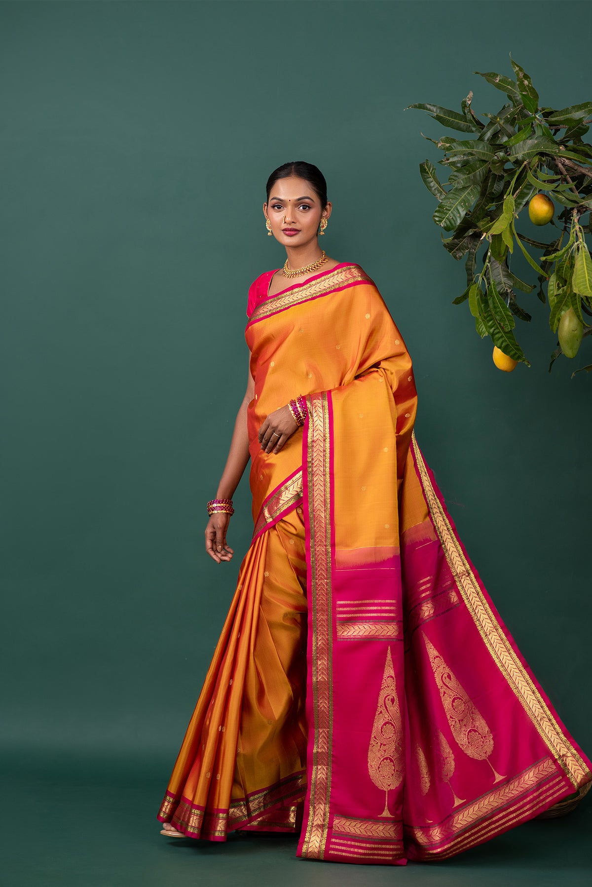 Flat view of Mustard Kanchipuram Silk Saree with Zari Butta on the body and Zari Border