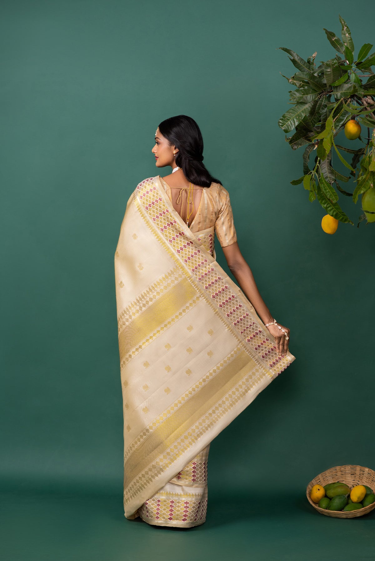 Close up image of the pallu of Beige Kanchipuram Silk Saree with Zari Butta on the body and Zari And Thread Border