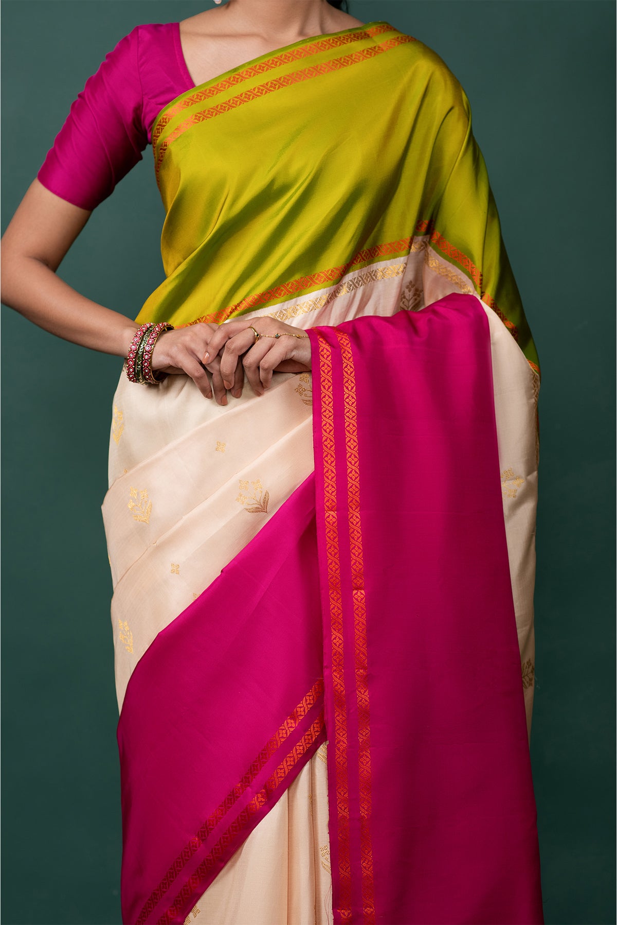 Close up image of the blouse of Multi Color Kanchipuram Silk Saree with Zari Butta on the body and Thread Border