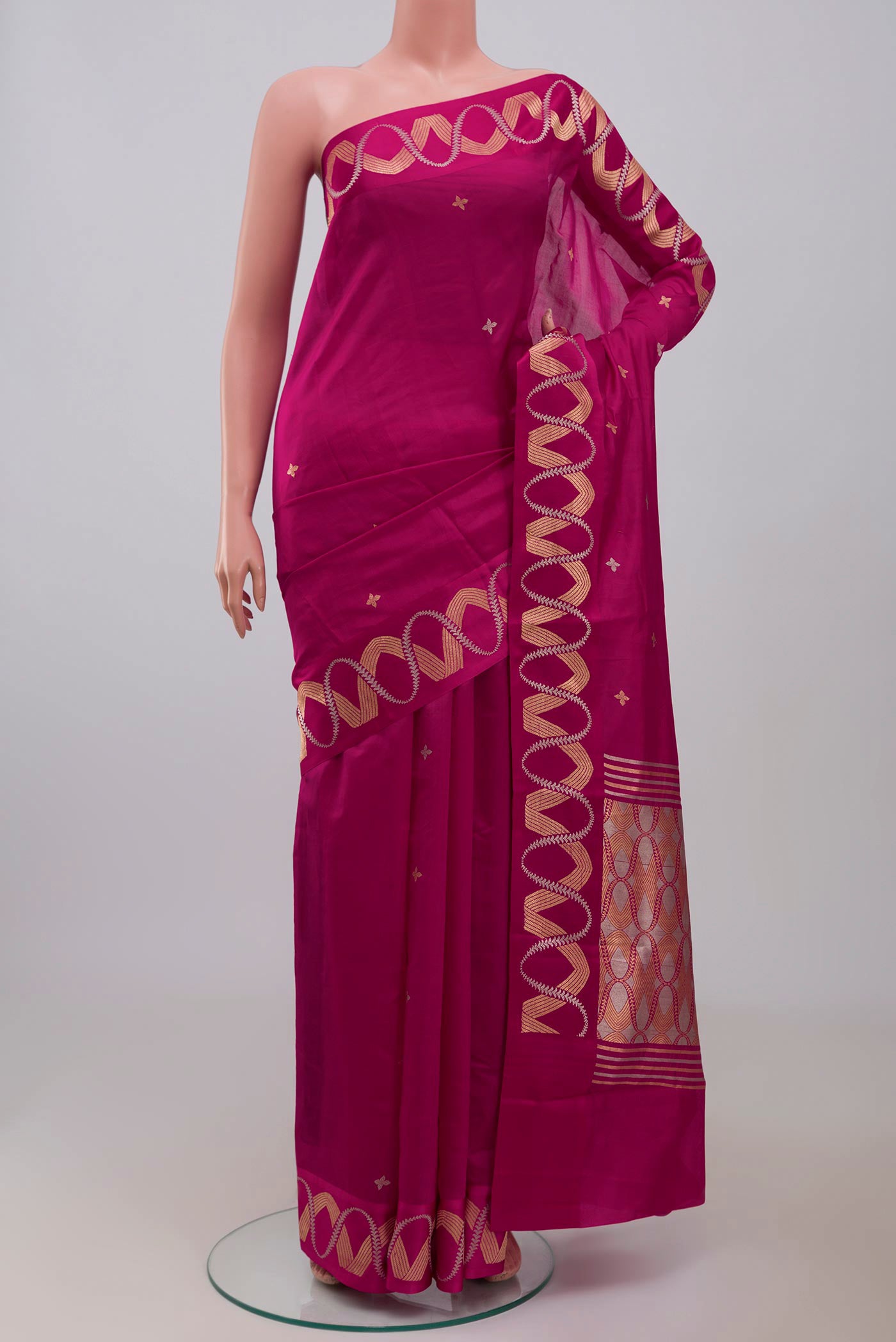 Pink Banarasi Katan Silk Saree with Zari Butta on the body and Zari Border displayed on a mannequin