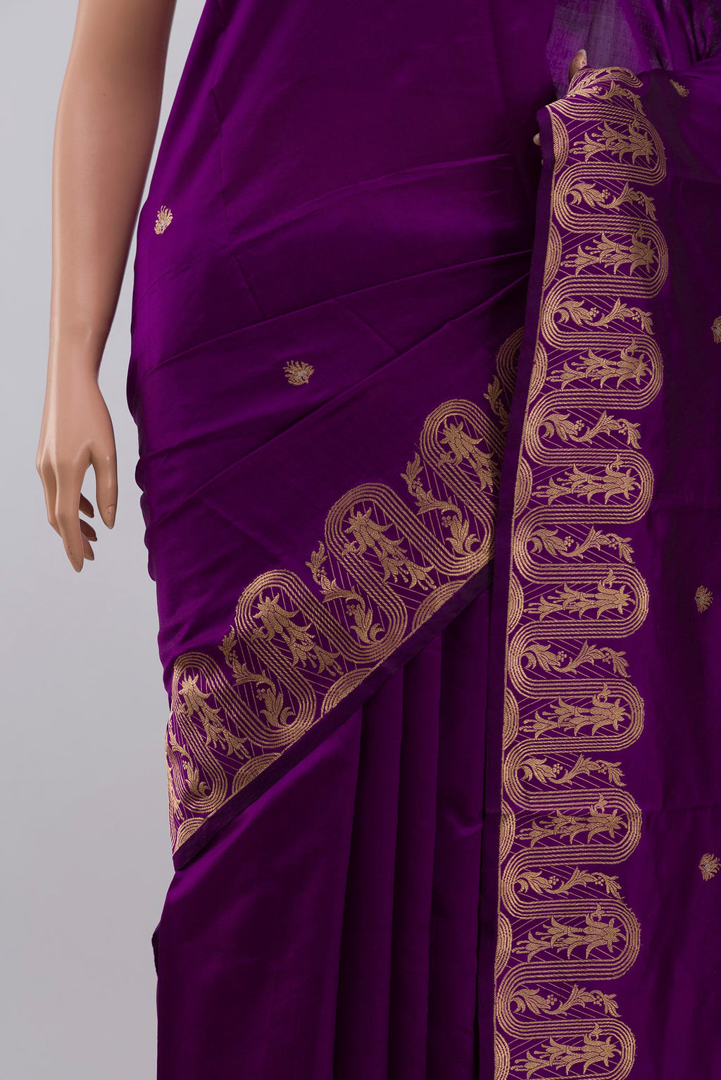 Close up of Violet Banarasi Katan Silk Saree with Zari Butta on the body and Zari Border displaying folds