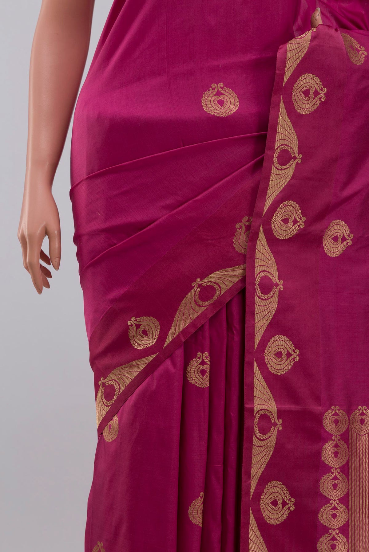 Close up of Pink Banarasi Katan Silk Saree with Zari Butta on the body and Zari Border displaying folds