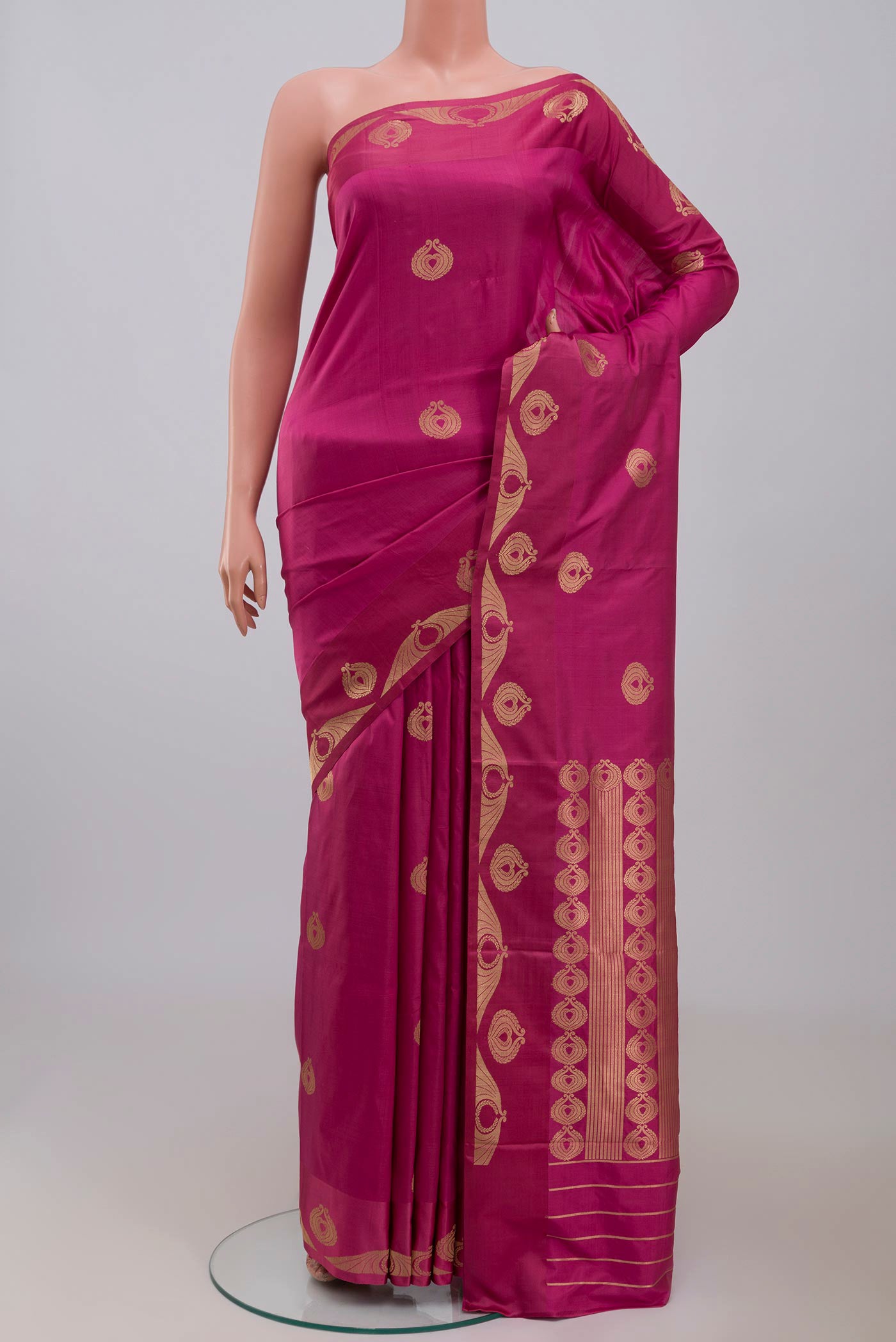 Pink Banarasi Katan Silk Saree with Zari Butta on the body and Zari Border displayed on a mannequin