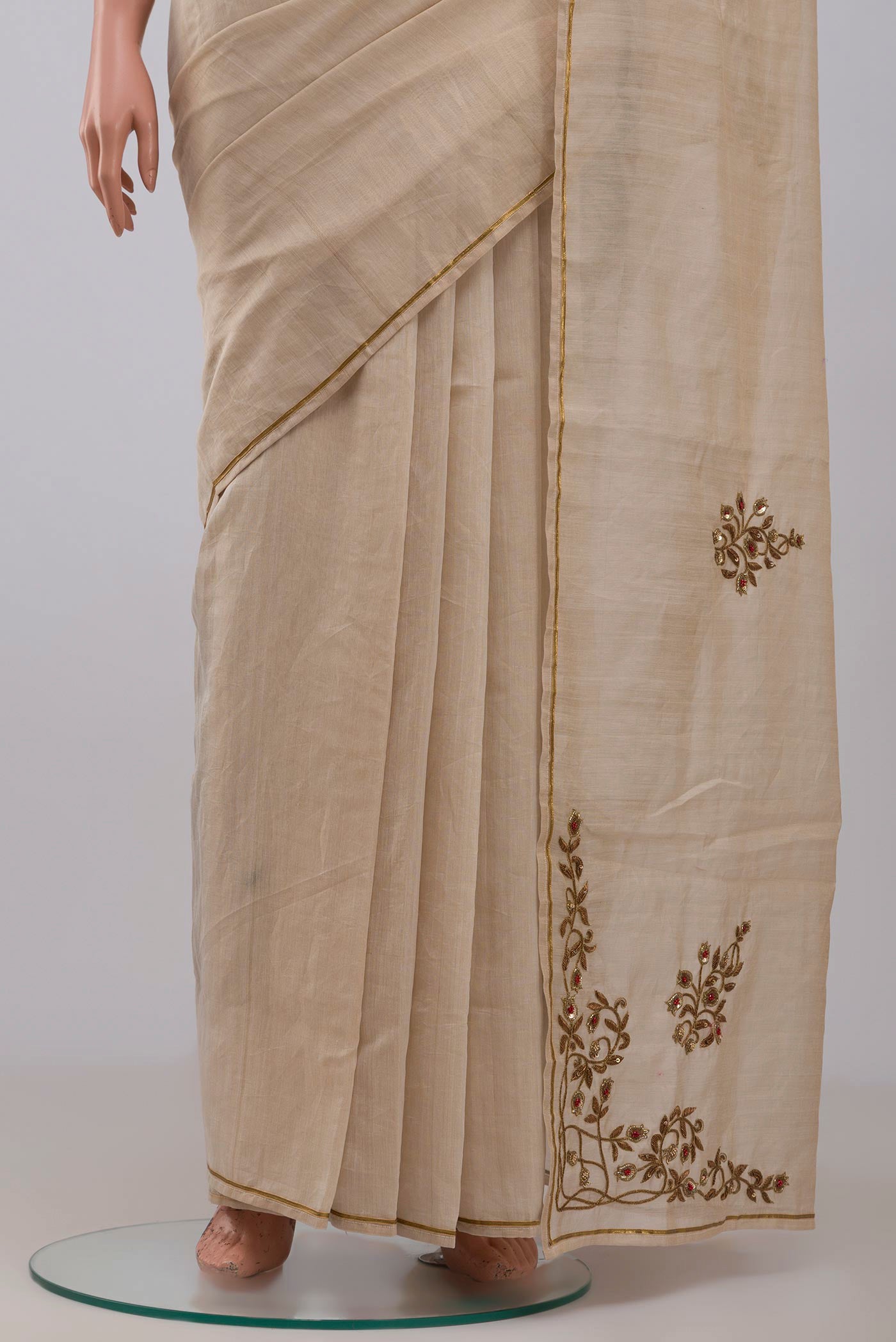 Pleats and pallu of Beige Chanderi Silk Cotton Saree with Embroidery on the body and Thin Zari Line