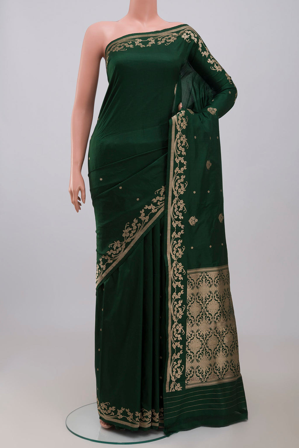 Green Banarasi Katan Silk Saree with Zari Butta on the body and Zari Border displayed on a mannequin