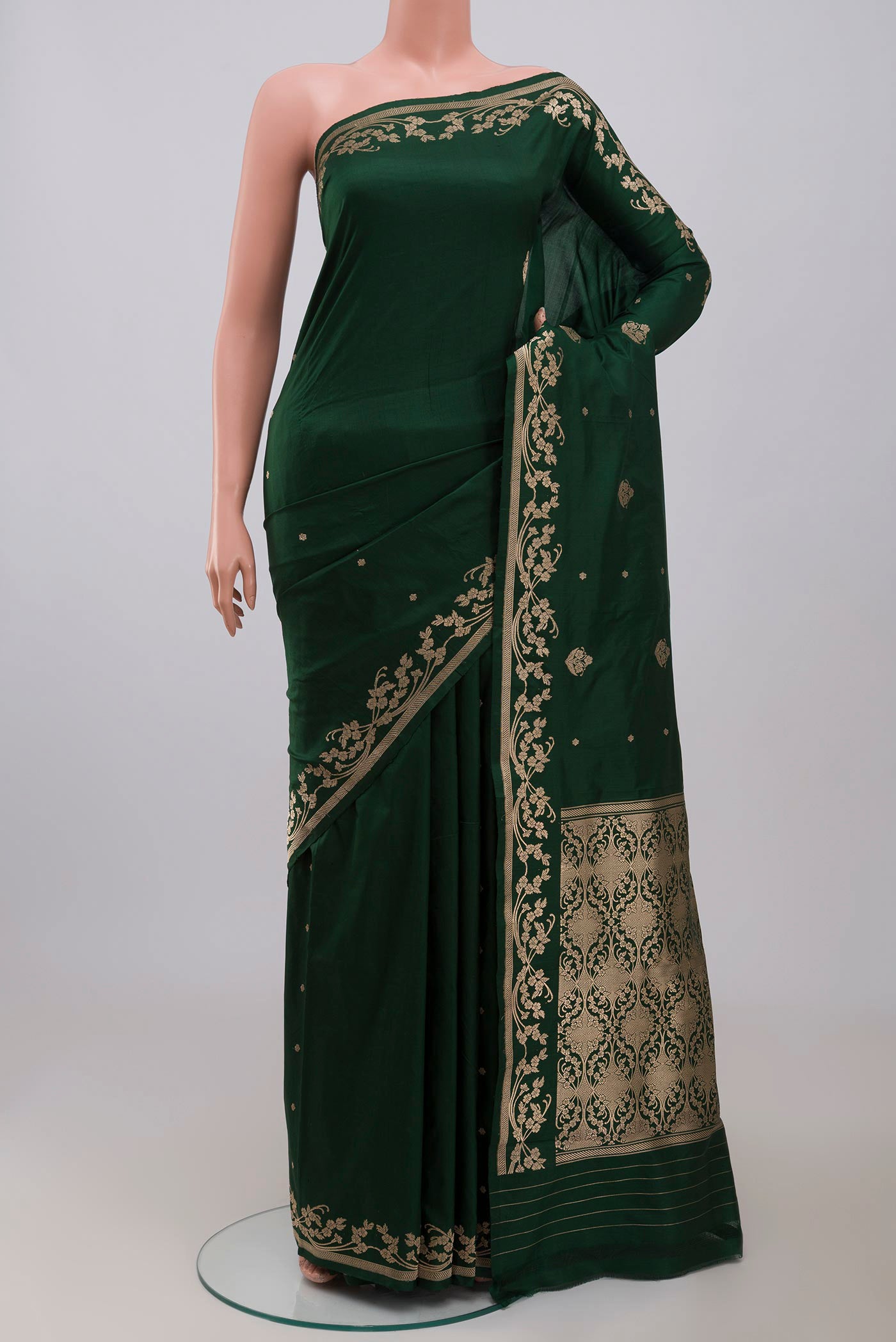 Green Banarasi Katan Silk Saree with Zari Butta on the body and Zari Border displayed on a mannequin