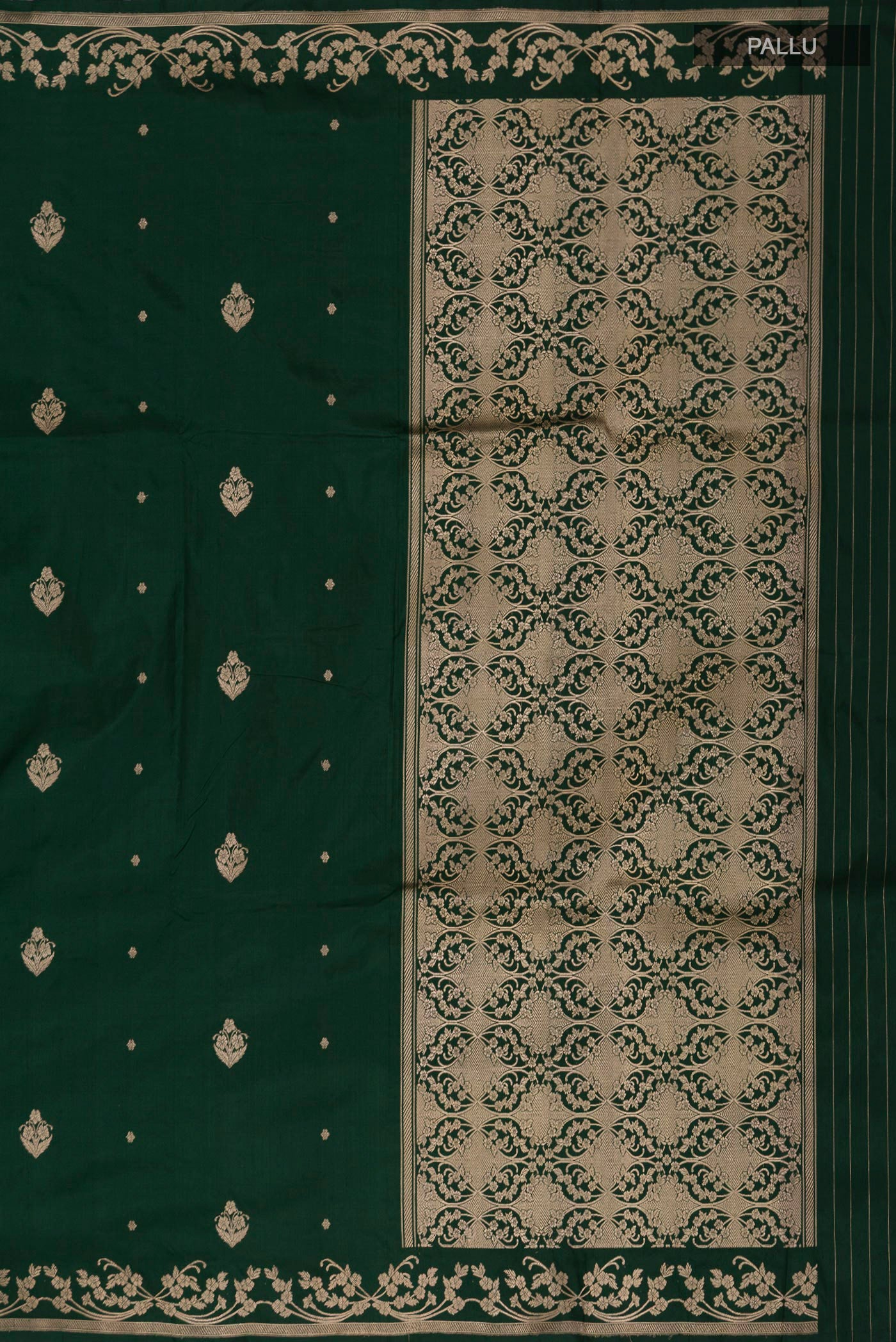 Close up image of the pallu of Green Banarasi Katan Silk Saree with Zari Butta on the body and Zari Border