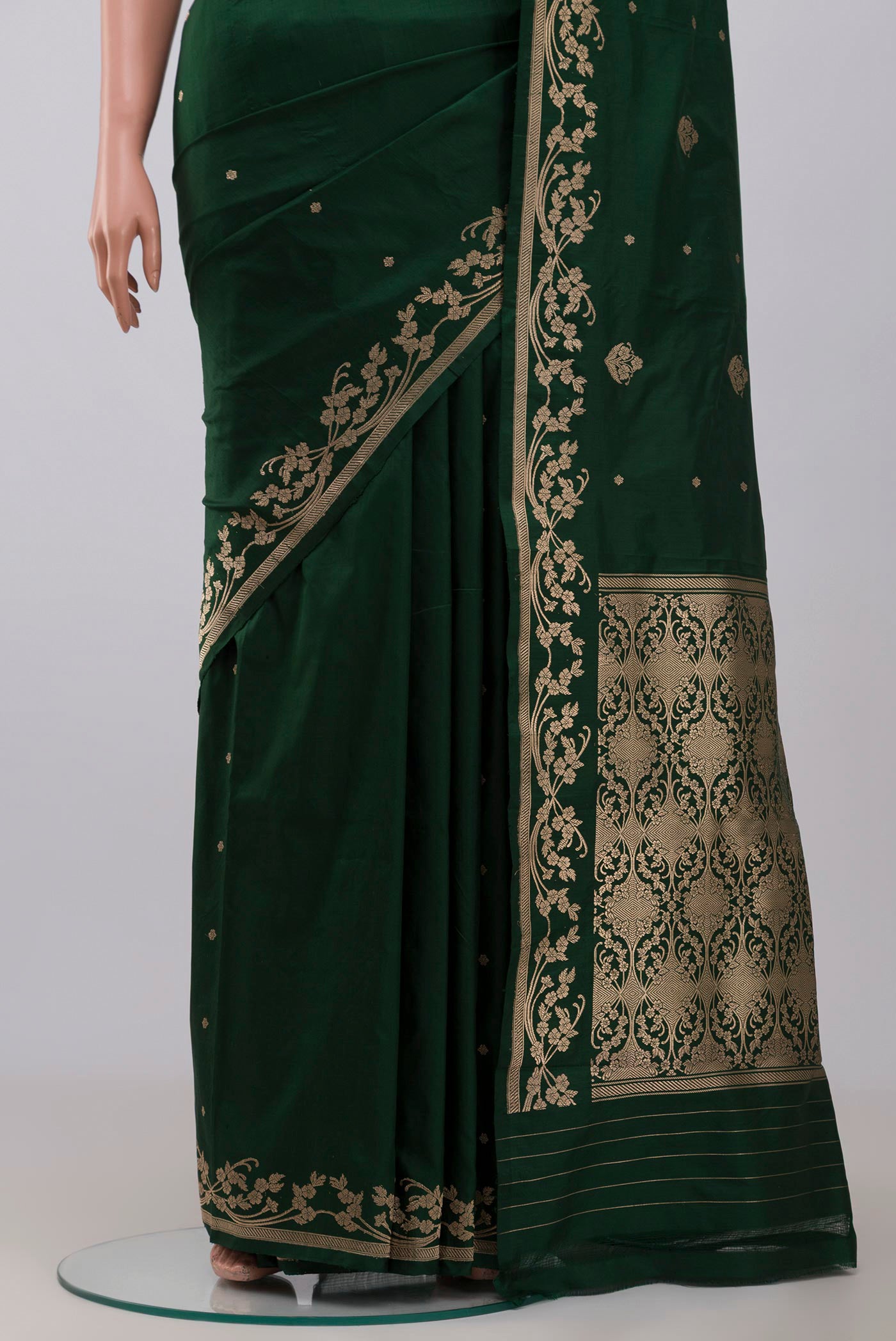 Pleats and pallu of Green Banarasi Katan Silk Saree with Zari Butta on the body and Zari Border