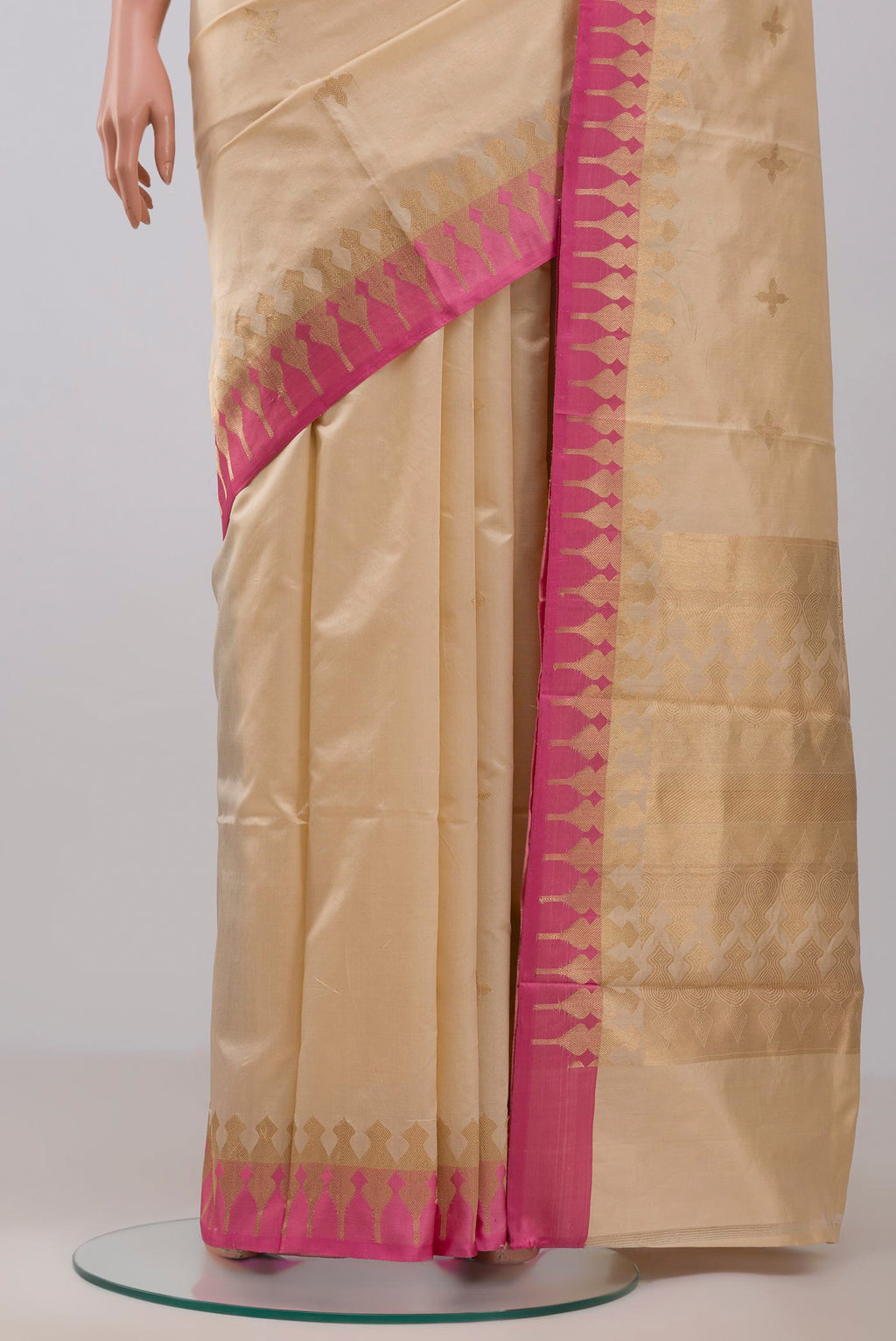 Pleats and pallu of Beige Banarasi Silk Saree with Zari Butta on the body and Zari Border
