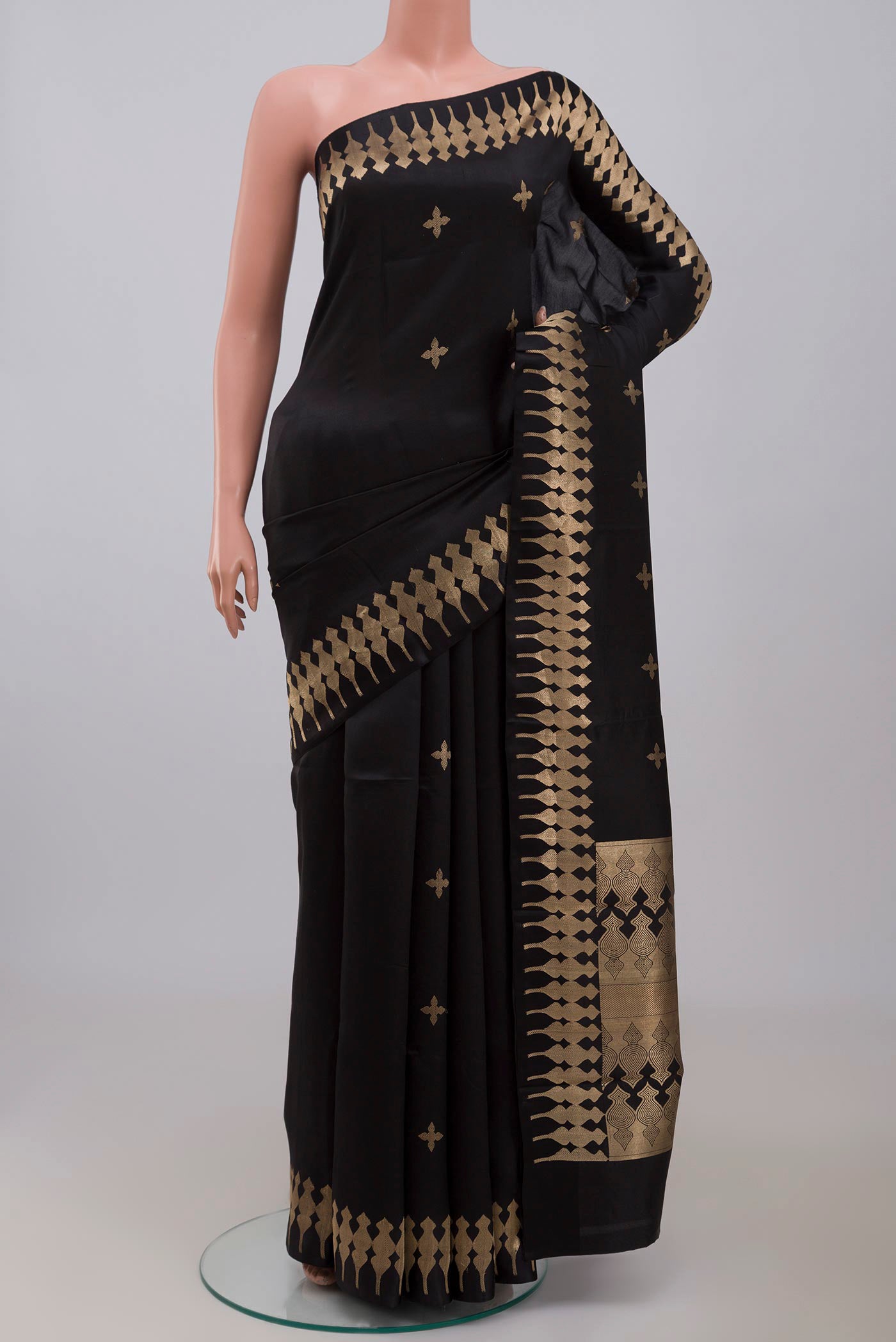 Black Banarasi Silk Saree with Zari Butta on the body and Zari Border displayed on a mannequin