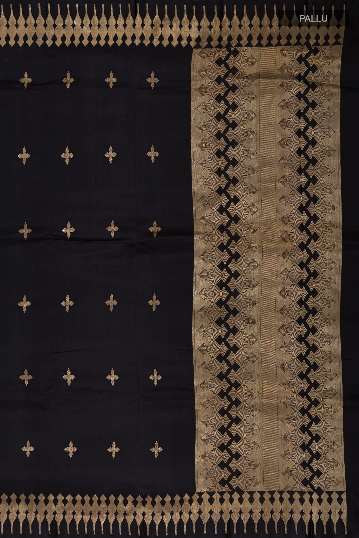 Close up image of the pallu of Black Banarasi Silk Saree with Zari Butta on the body and Zari Border