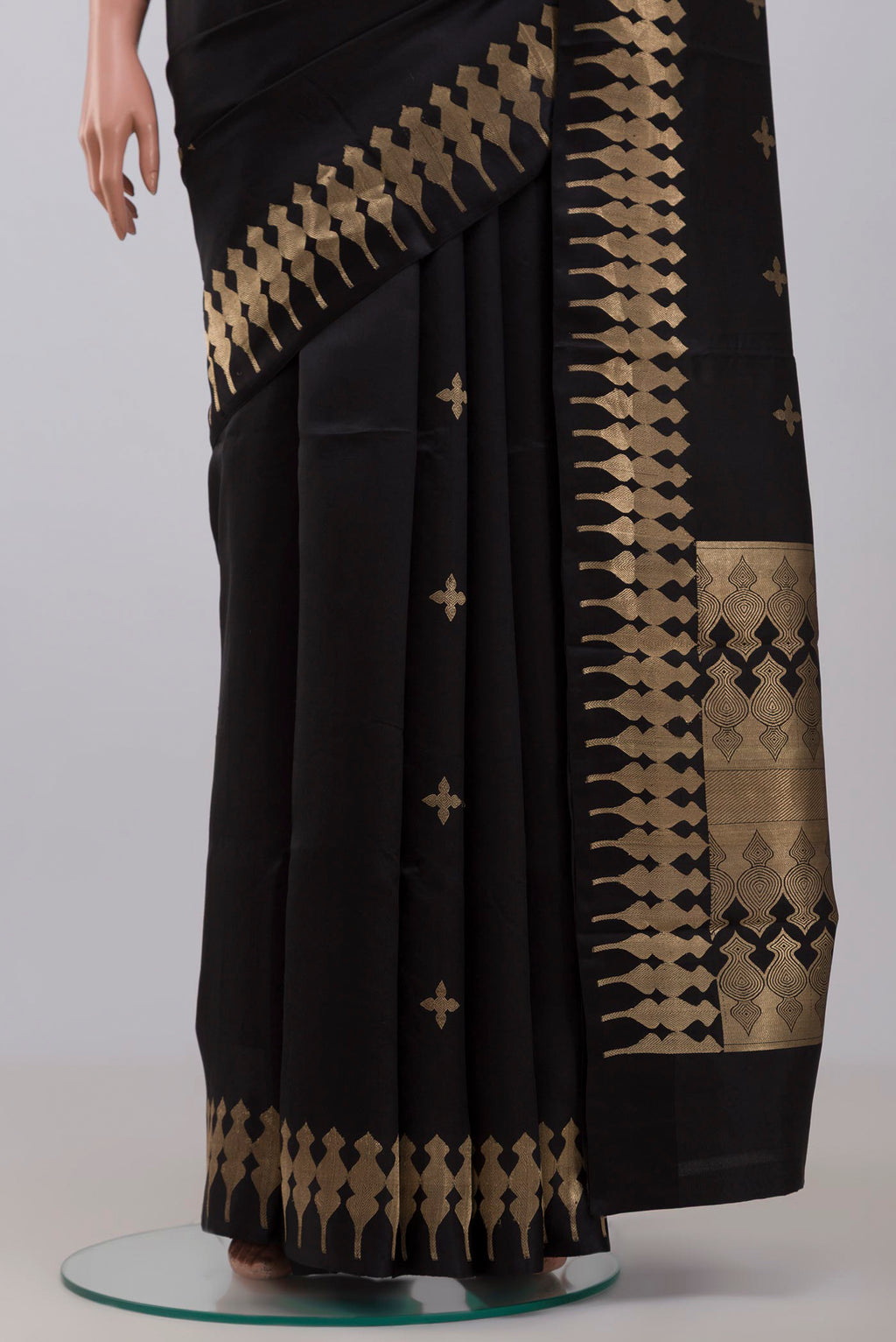 Pleats and pallu of Black Banarasi Silk Saree with Zari Butta on the body and Zari Border