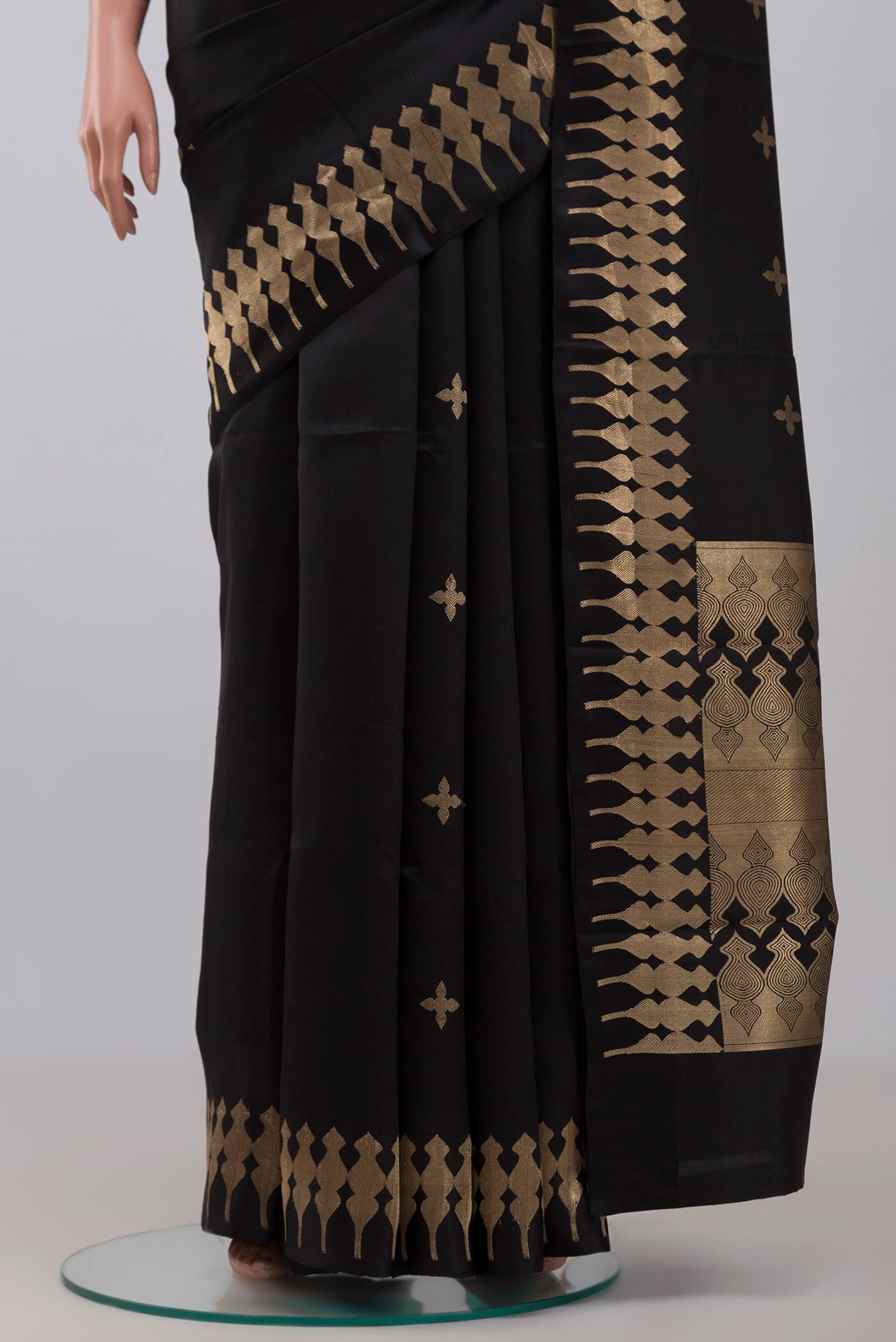 Pleats and pallu of Black Banarasi Silk Saree with Zari Butta on the body and Zari Border