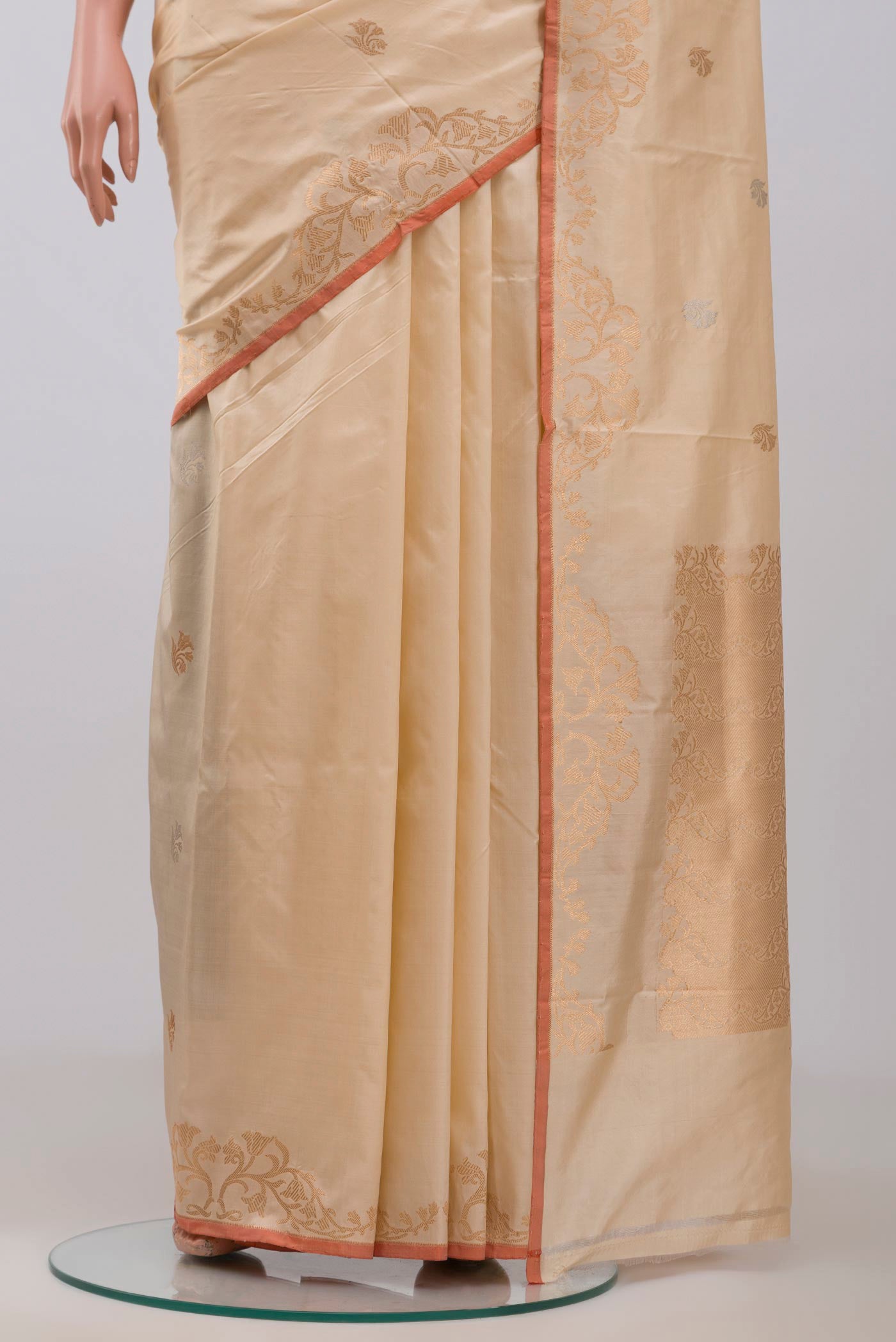 Pleats and pallu of Beige Banarasi Katan Silk Saree with Zari Butta on the body and Zari Border