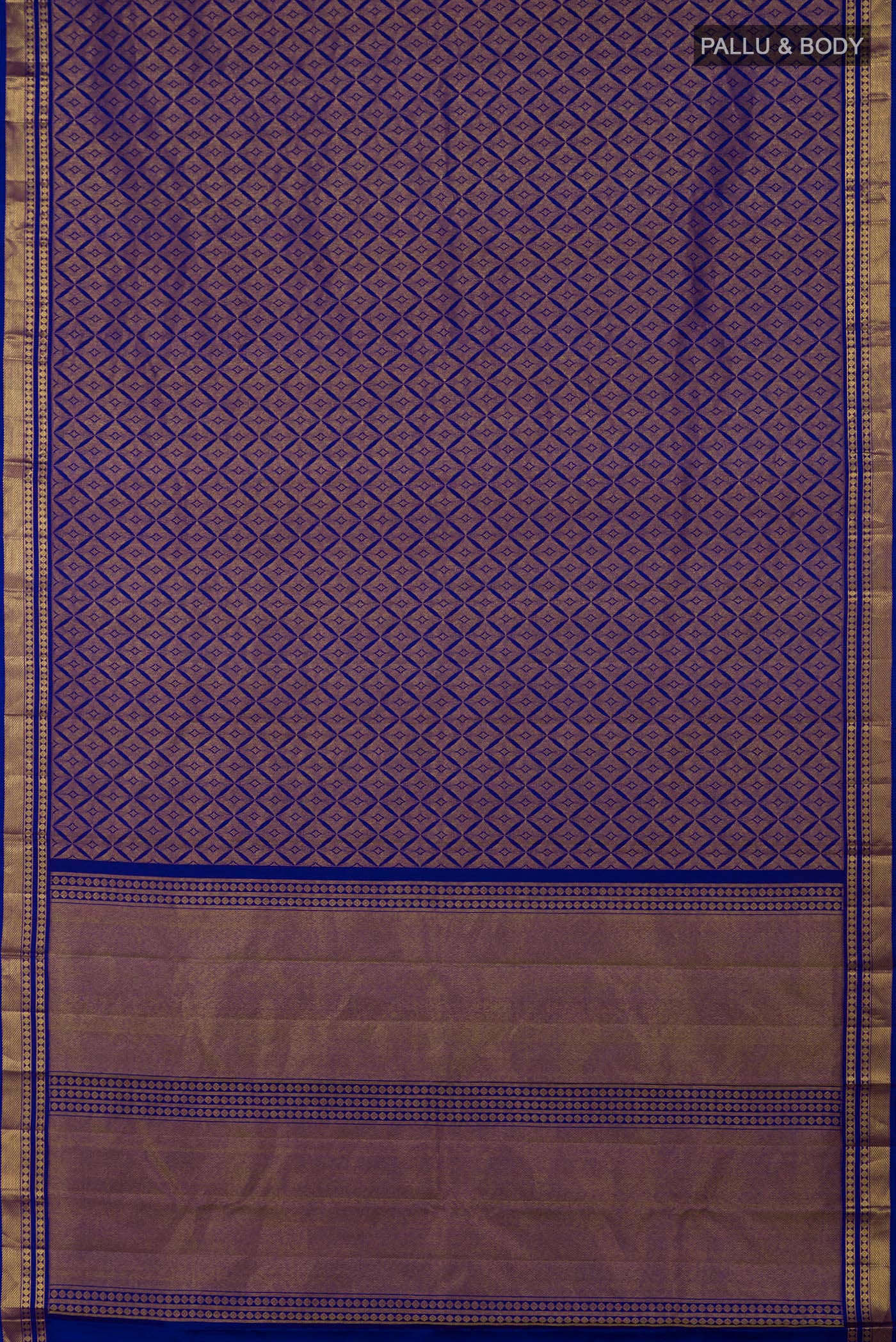 Flat view of Handwoven in pure mulberry silk with half-fine gold and silver zari, this blue Kanjeevaram saree celebrates the harmony of line and light. A refined checkered pattern, formed by intersecting gold zari lines, unfolds across the body and continues into the radiant gold pallu. Framed by two broad gold bands separated by a slender gold stripe, the border lends the weave timeless balance and elegance.