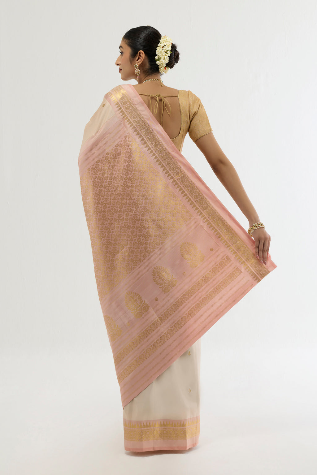Flat view of Cream Kanchipuram Silk Saree with Zari Butta on the body and Zari Border