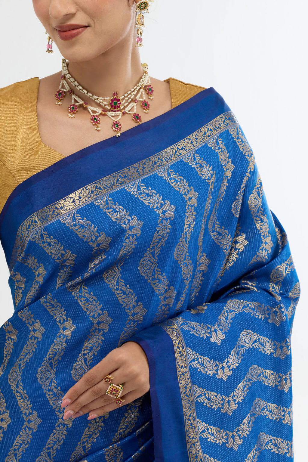 Border image of Blue Kanchipuram Silk Saree with Zari Butta on the body and Zari Border