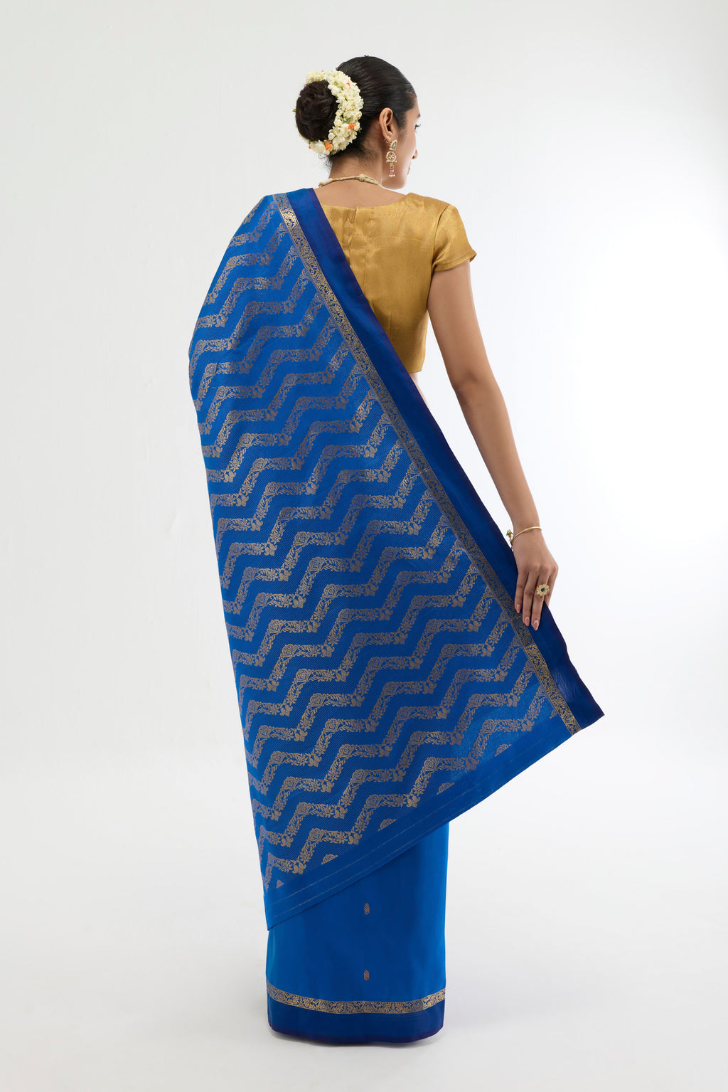 Flat view of Blue Kanchipuram Silk Saree with Zari Butta on the body and Zari Border