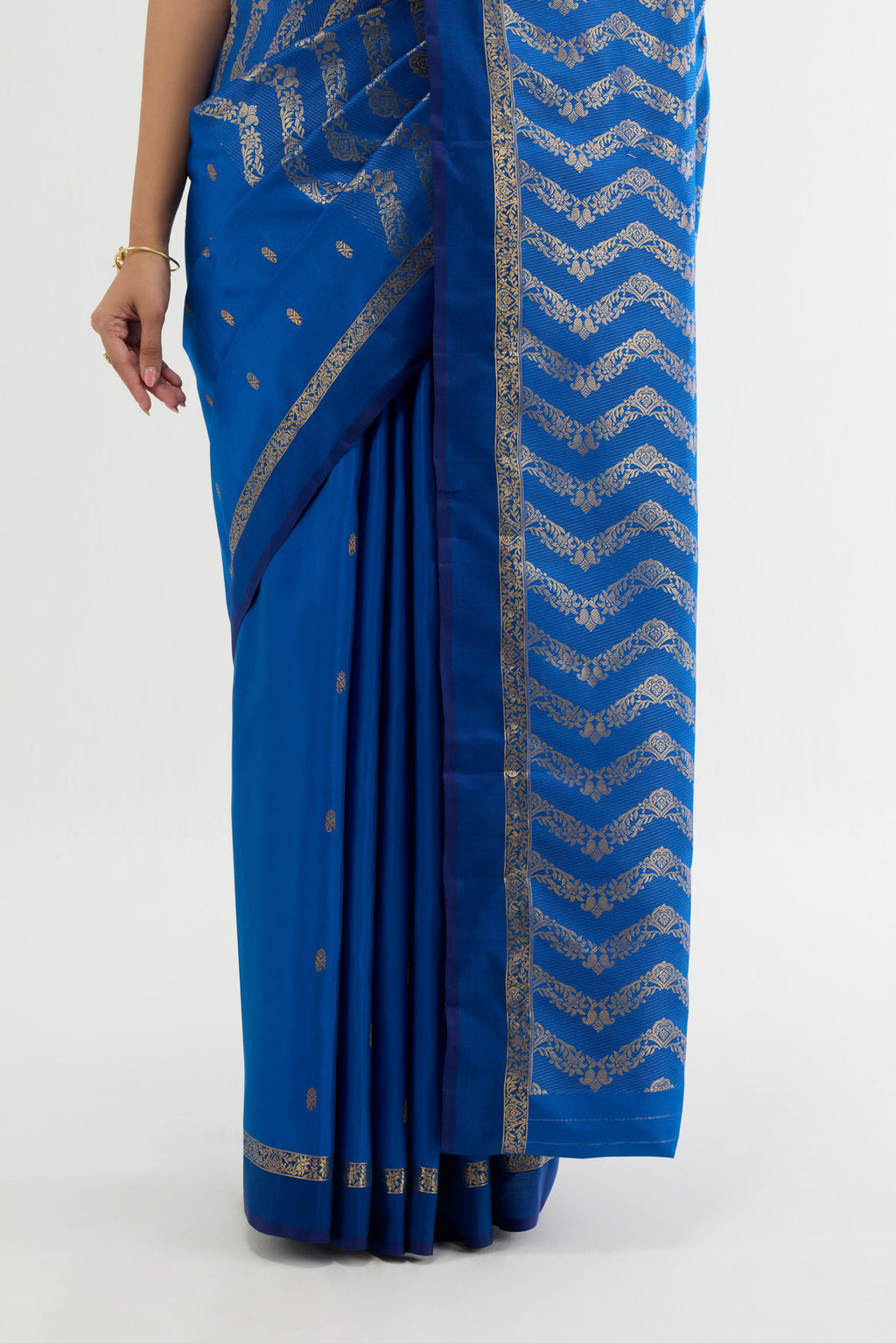 Pleats and pallu of Blue Kanchipuram Silk Saree with Zari Butta on the body and Zari Border