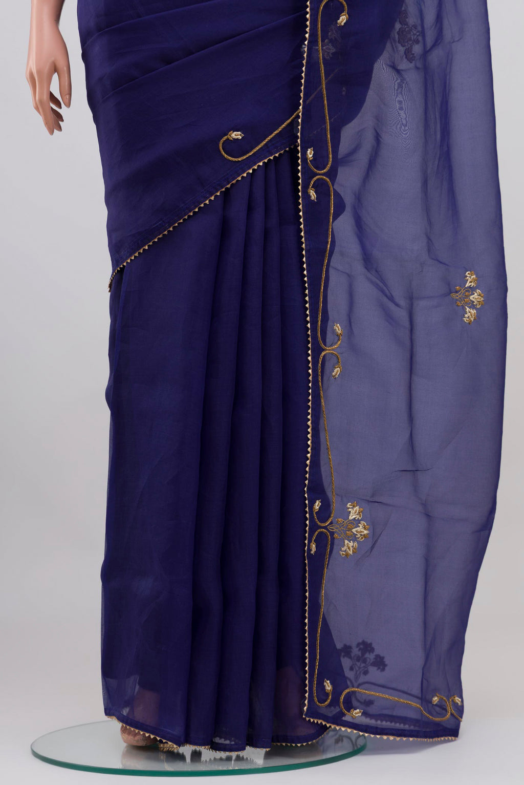 Pleats and pallu of Blue Organza Silk Saree with Embroidery on the body and Embroidery Border