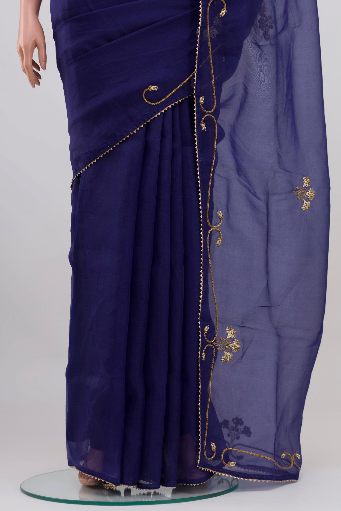 Pleats and pallu of Blue Organza Silk Saree with Embroidery on the body and Embroidery Border