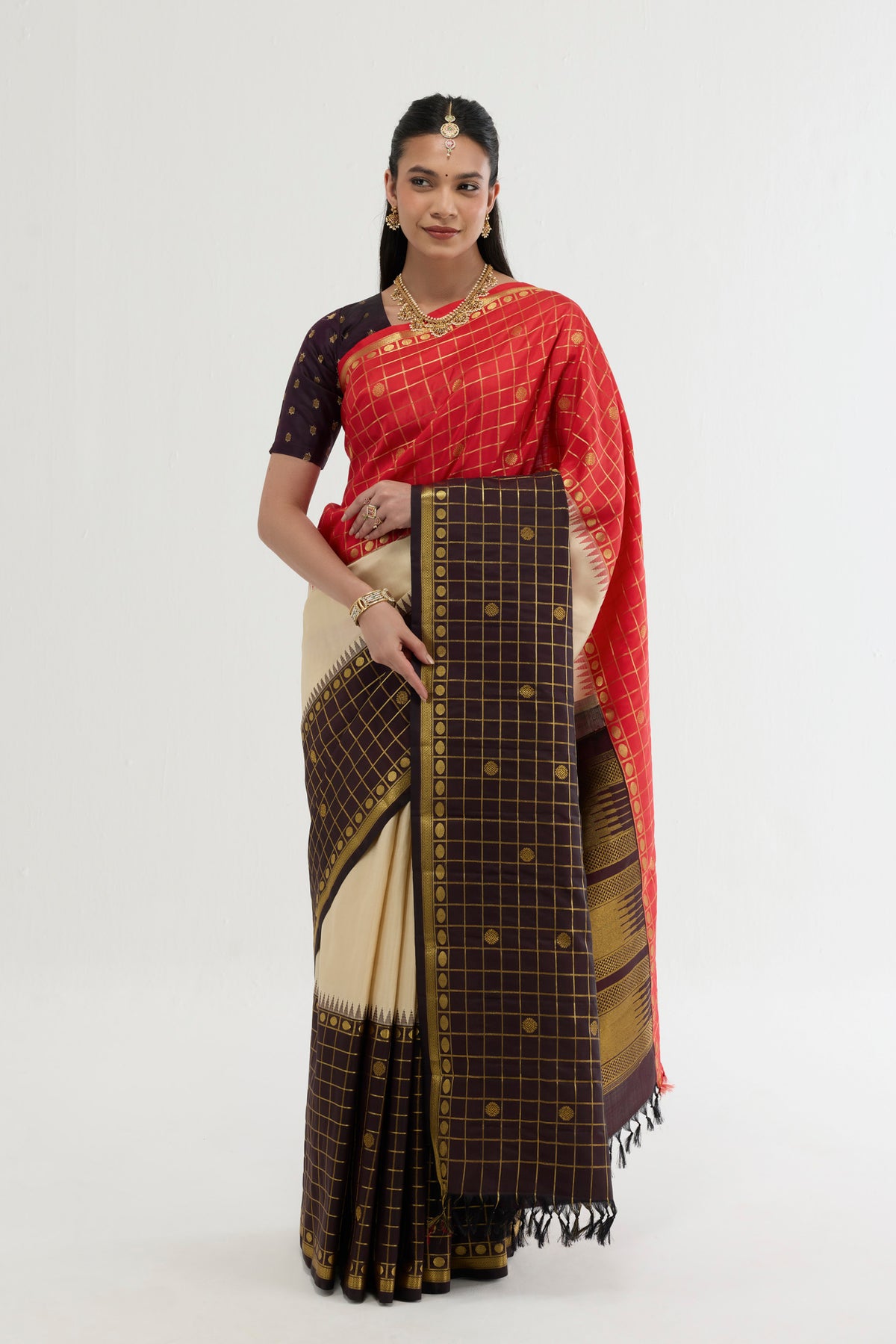 Multi Color Kanchipuram Silk Saree with Plain Body and Checks Border displayed on a mannequin