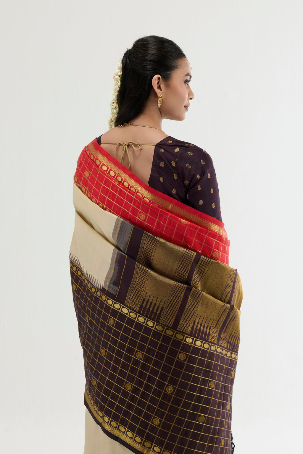 Close up image of the pallu of Multi Color Kanchipuram Silk Saree with Plain Body and Checks Border