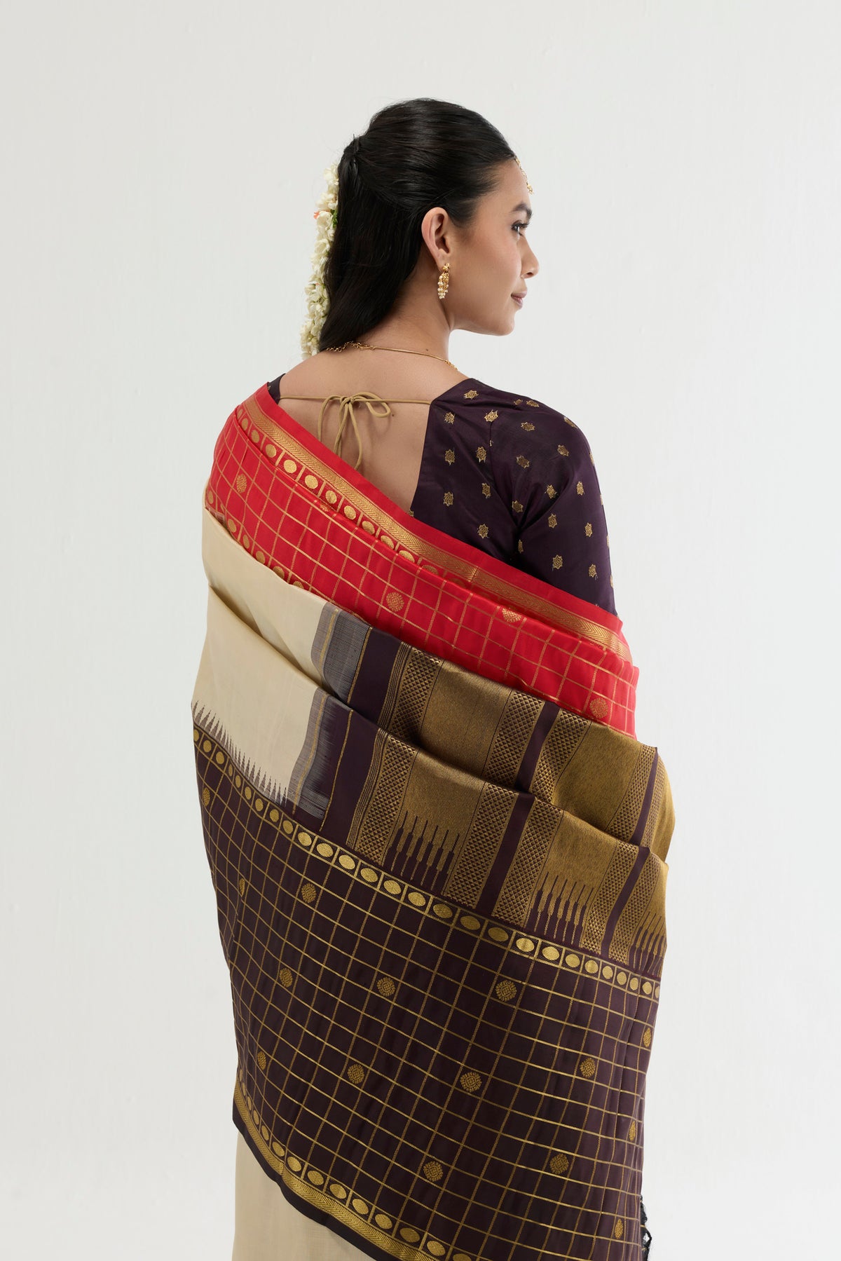 Close up image of the pallu of Multi Color Kanchipuram Silk Saree with Plain Body and Checks Border