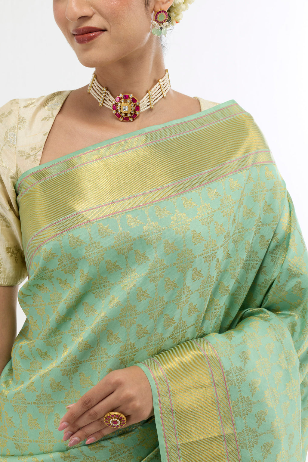 Border image of Green Kanchipuram Silk Saree with Zari Brocade on the body and Zari Border