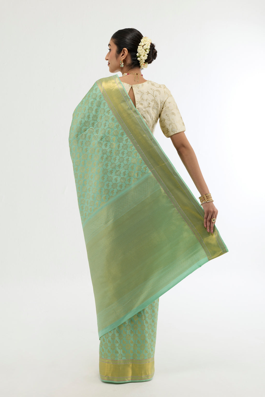 Flat view of Green Kanchipuram Silk Saree with Zari Brocade on the body and Zari Border