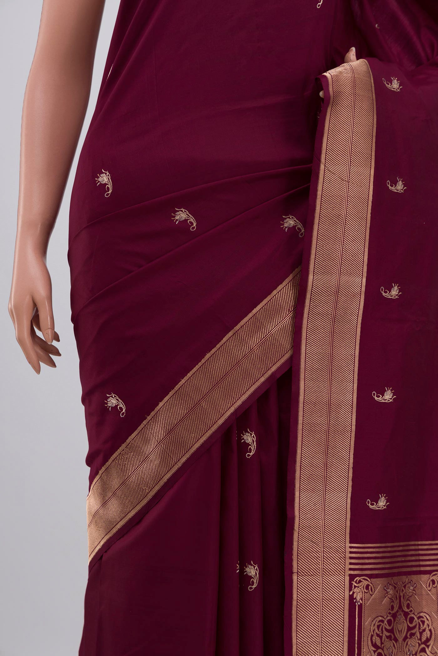 Close up of Purple Banarasi Katan Silk Saree with Zari Butta on the body and Zari Border displaying folds