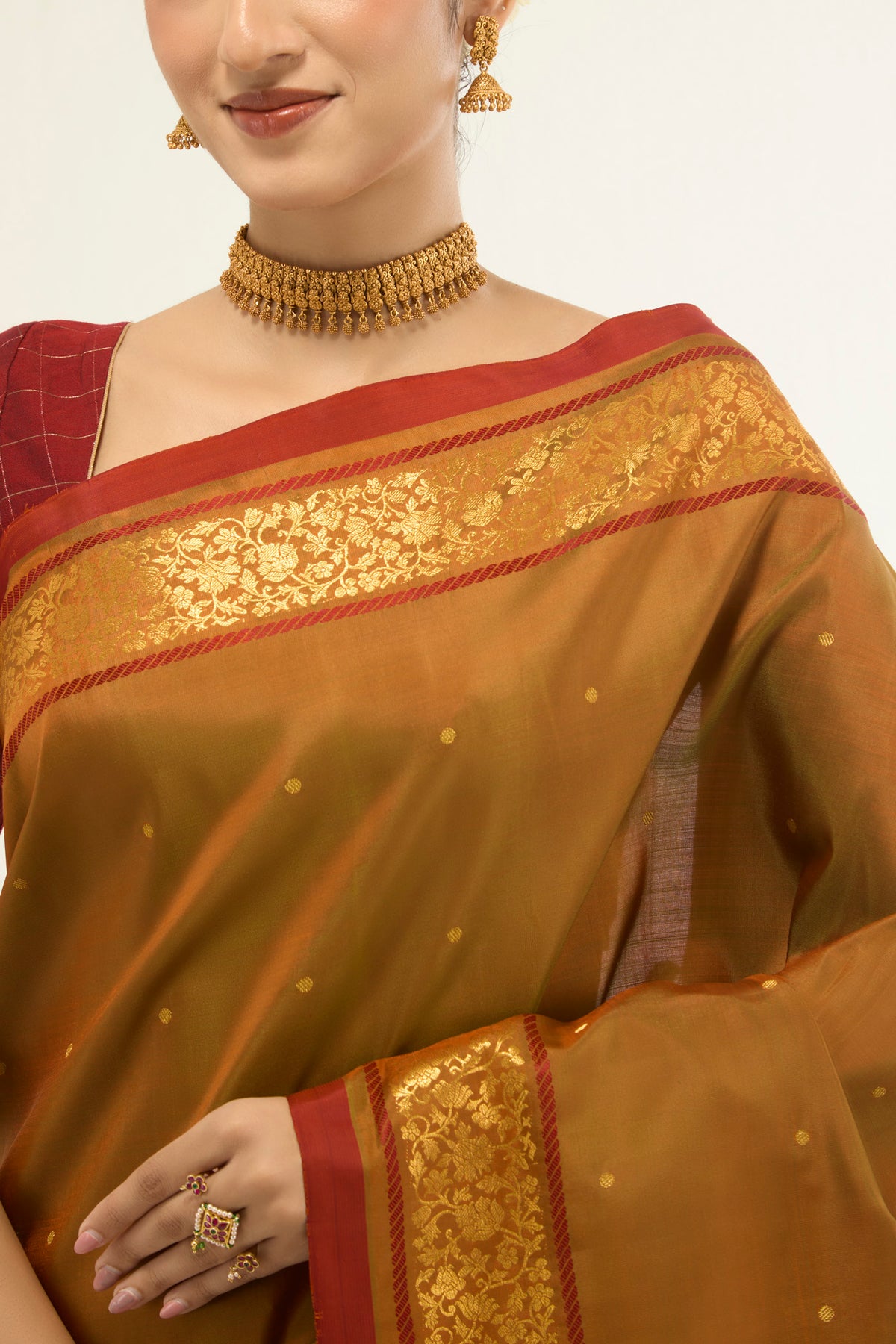 Border image of Mustard with Green Color Kanchipuram Silk Saree with Zari Butta on the body and Zari Border