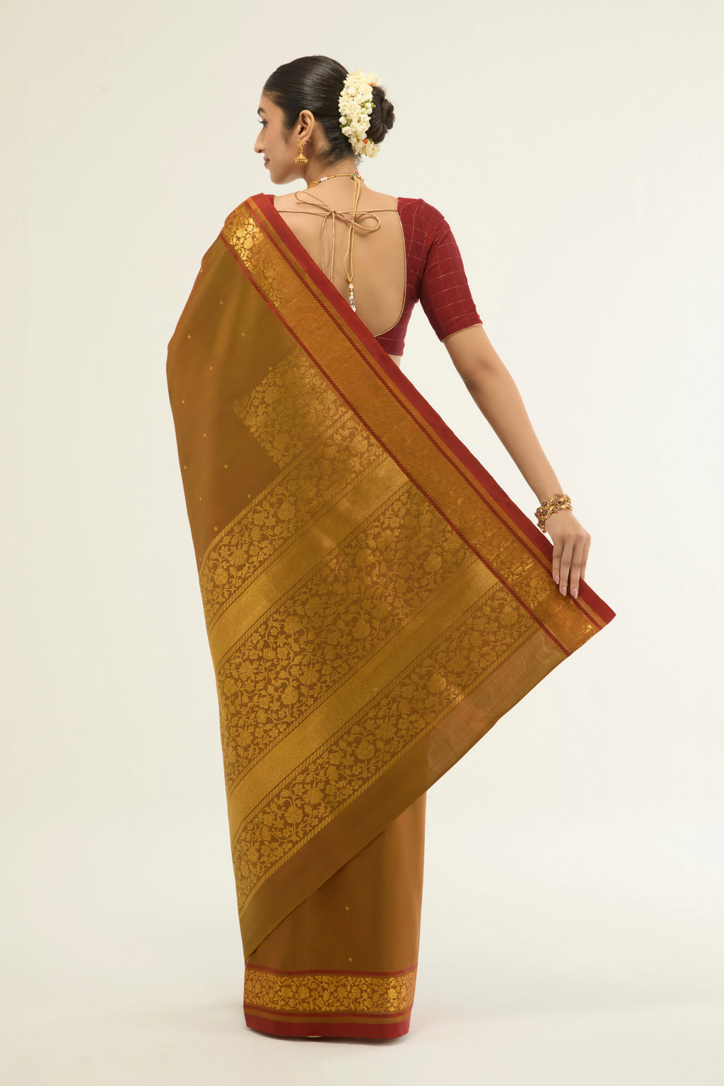 Flat view of Mustard with Green Color Kanchipuram Silk Saree with Zari Butta on the body and Zari Border