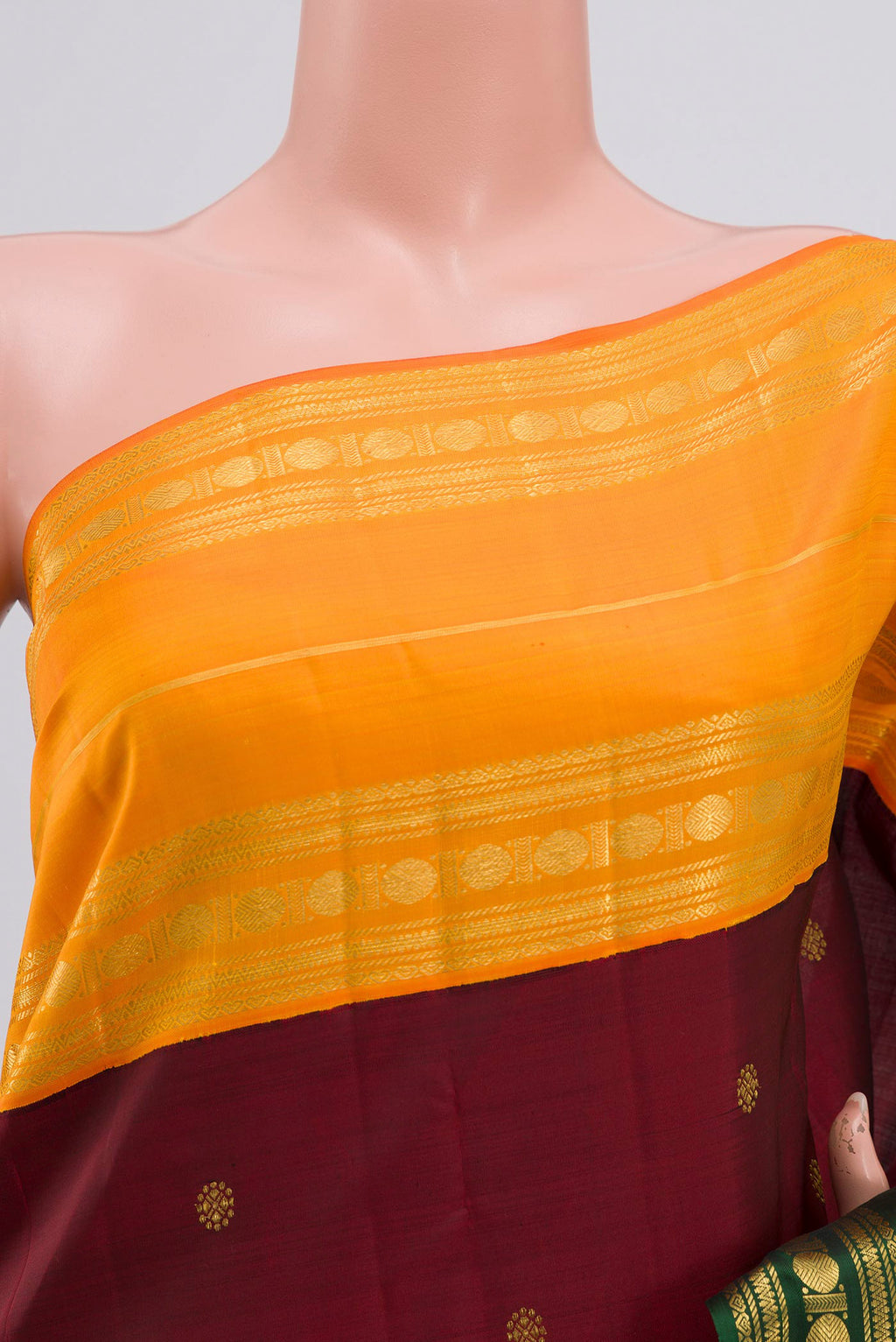 Border image of Maroon Kanchipuram Silk Saree with Zari Butta on the body and Ganga Jamuna Border