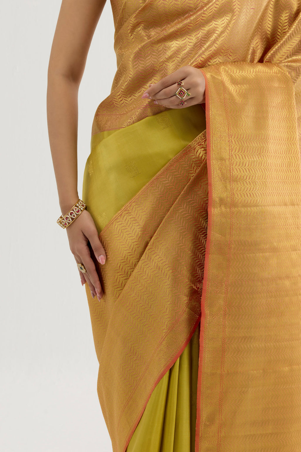 Close up image of the blouse of Multi Color Kanchipuram Silk Saree with Zari Butta on the body and Zari Border