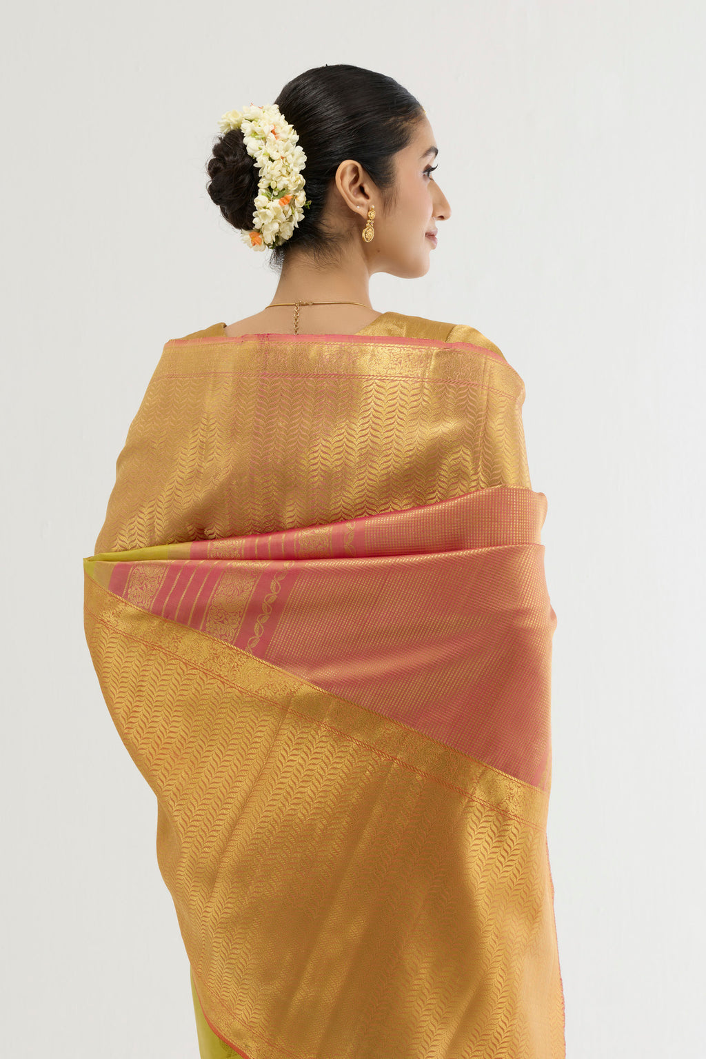 Close up image of the pallu of Multi Color Kanchipuram Silk Saree with Zari Butta on the body and Zari Border