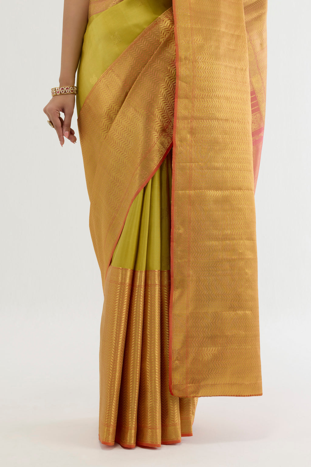 Pleats and pallu of Multi Color Kanchipuram Silk Saree with Zari Butta on the body and Zari Border