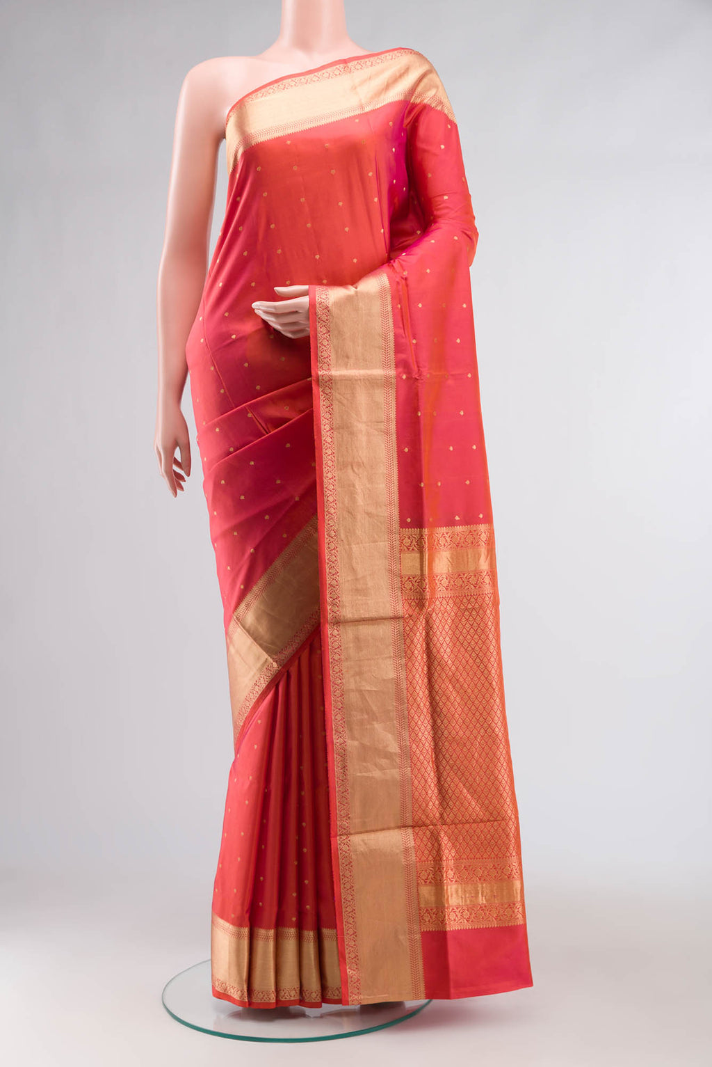 Maroon Banarasi Raw Silk Saree with Checked design on the body and Zari Border.  displayed on a mannequin