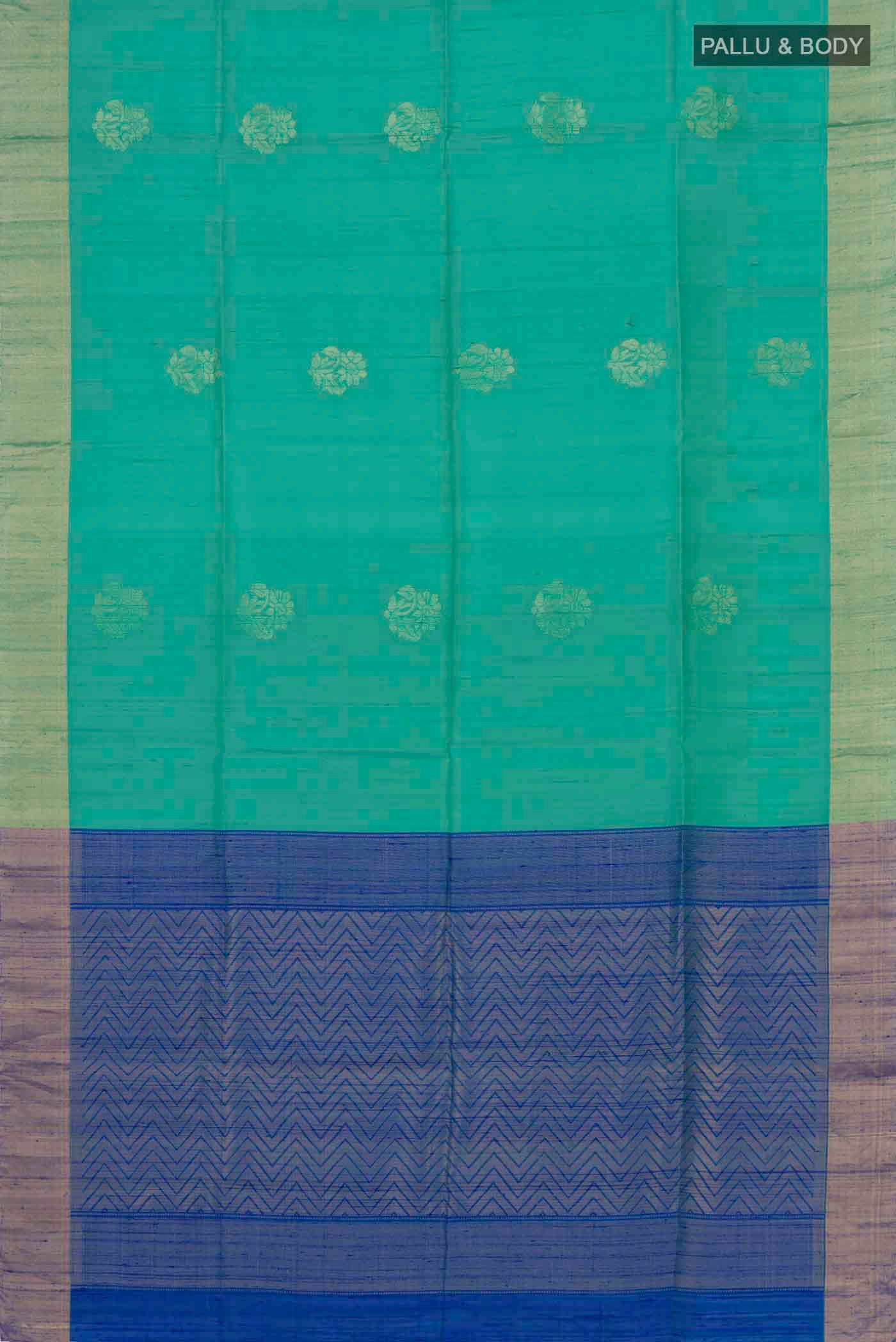 Flat view of Green Raw Silk Saree with Zari Butta on the body and Zari Border. 