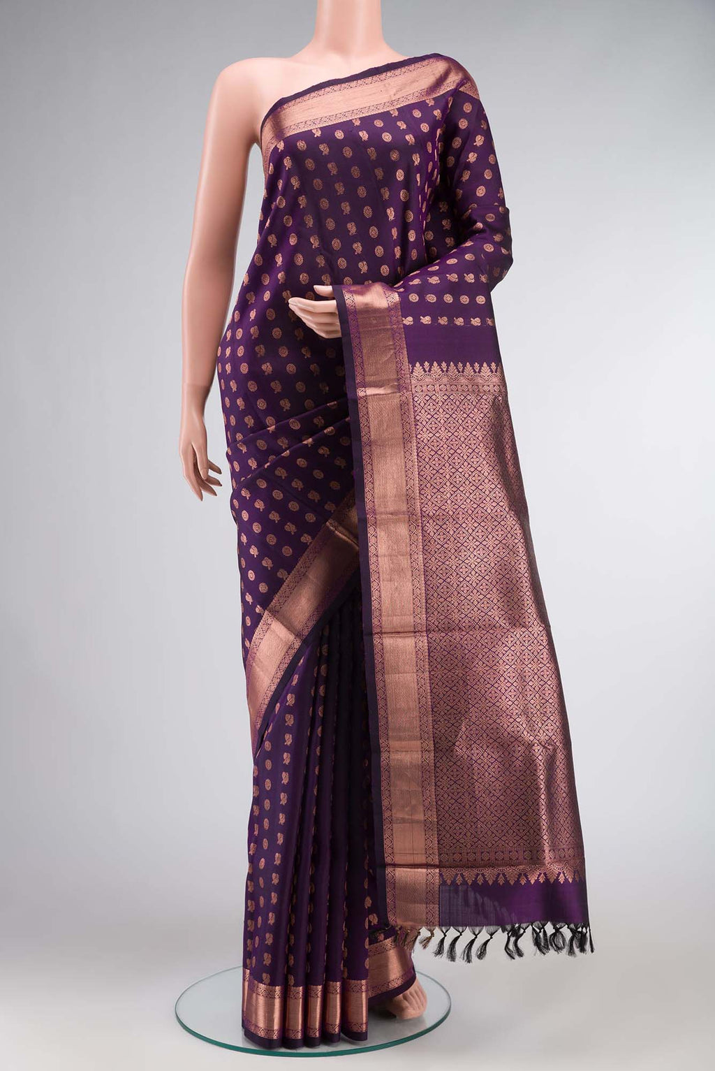 Sandal Mysore Crepe Silk Saree with Floral Print on the body and Zari Border.  displayed on a mannequin