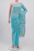 Blue Chikankari Cotton Saree with Embroidery on the body and Embroidery Border.  displayed on a mannequin