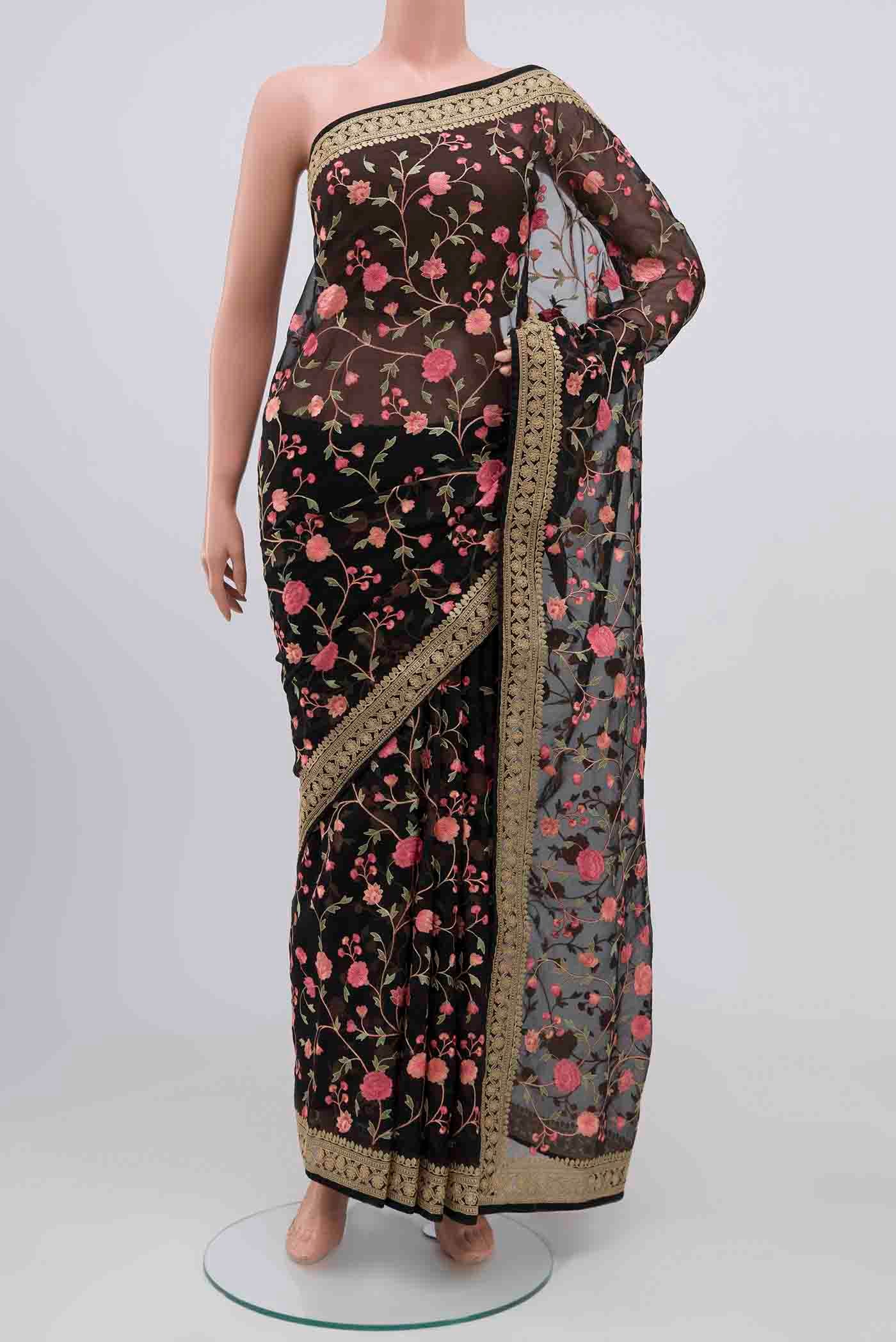 Black Blended Organza Silk Saree with Embroidery on the body and Embroidery Border.  displayed on a mannequin