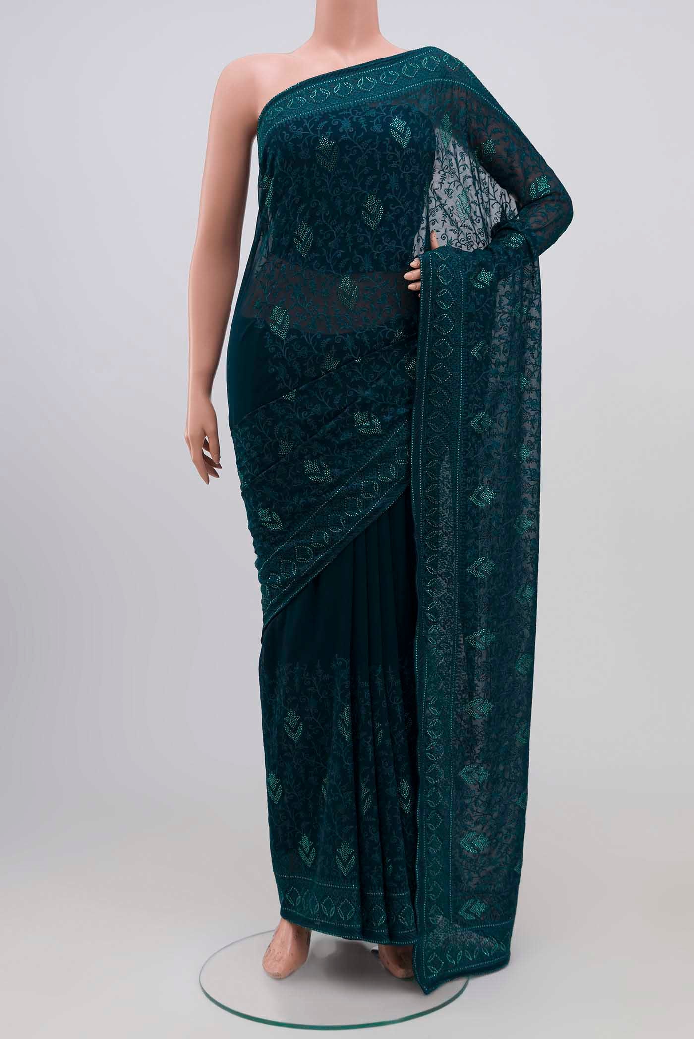 Blue Blended Georgette Saree with Embroidery on the body and Embroidery Border.  displayed on a mannequin