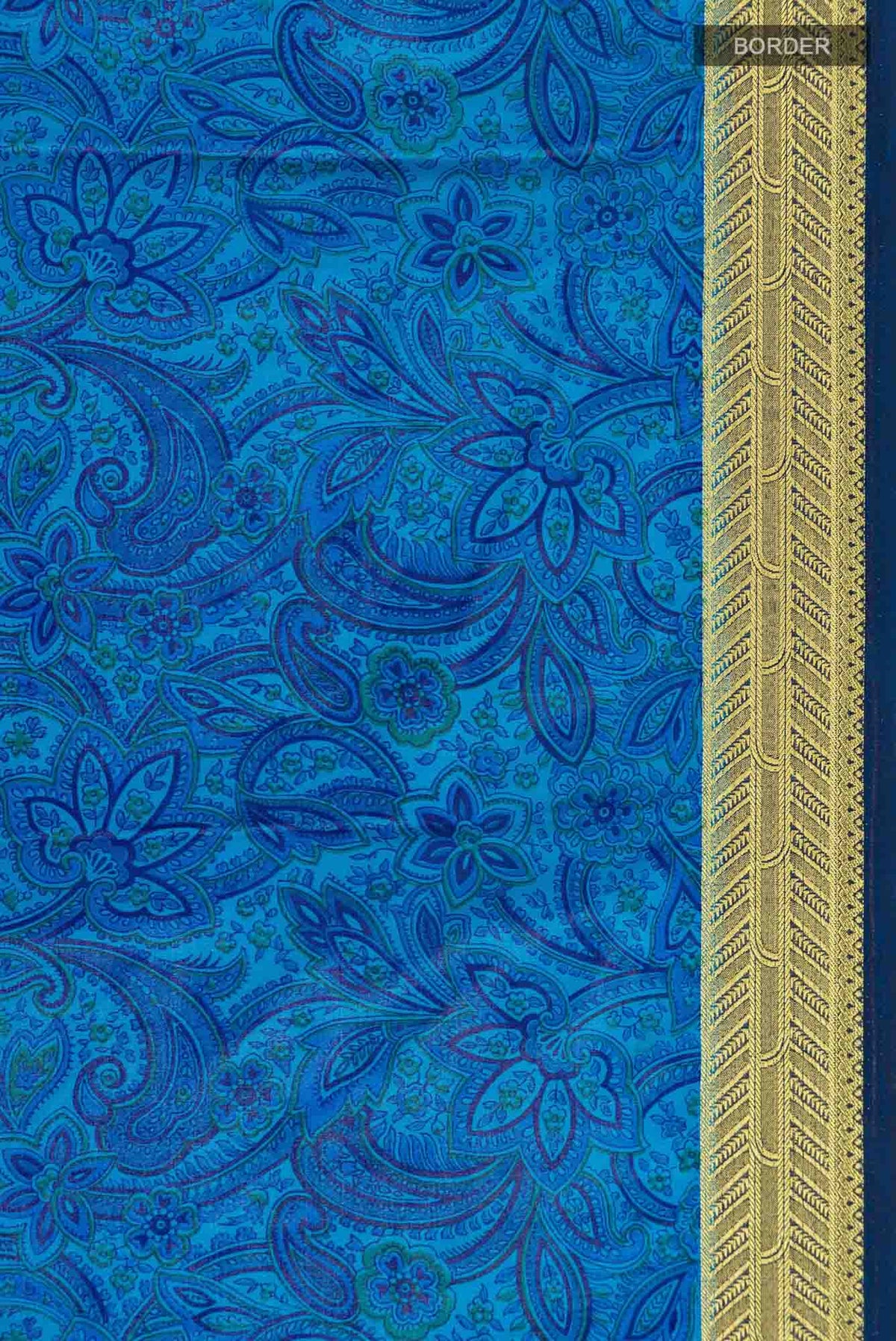 Border image of Blue Blended Crepe Saree with Floral Print on the body and Zari Border. 