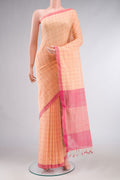 Peach Mangalagiri Cotton Saree with Checked design on the body and Plain Border.  displayed on a mannequin