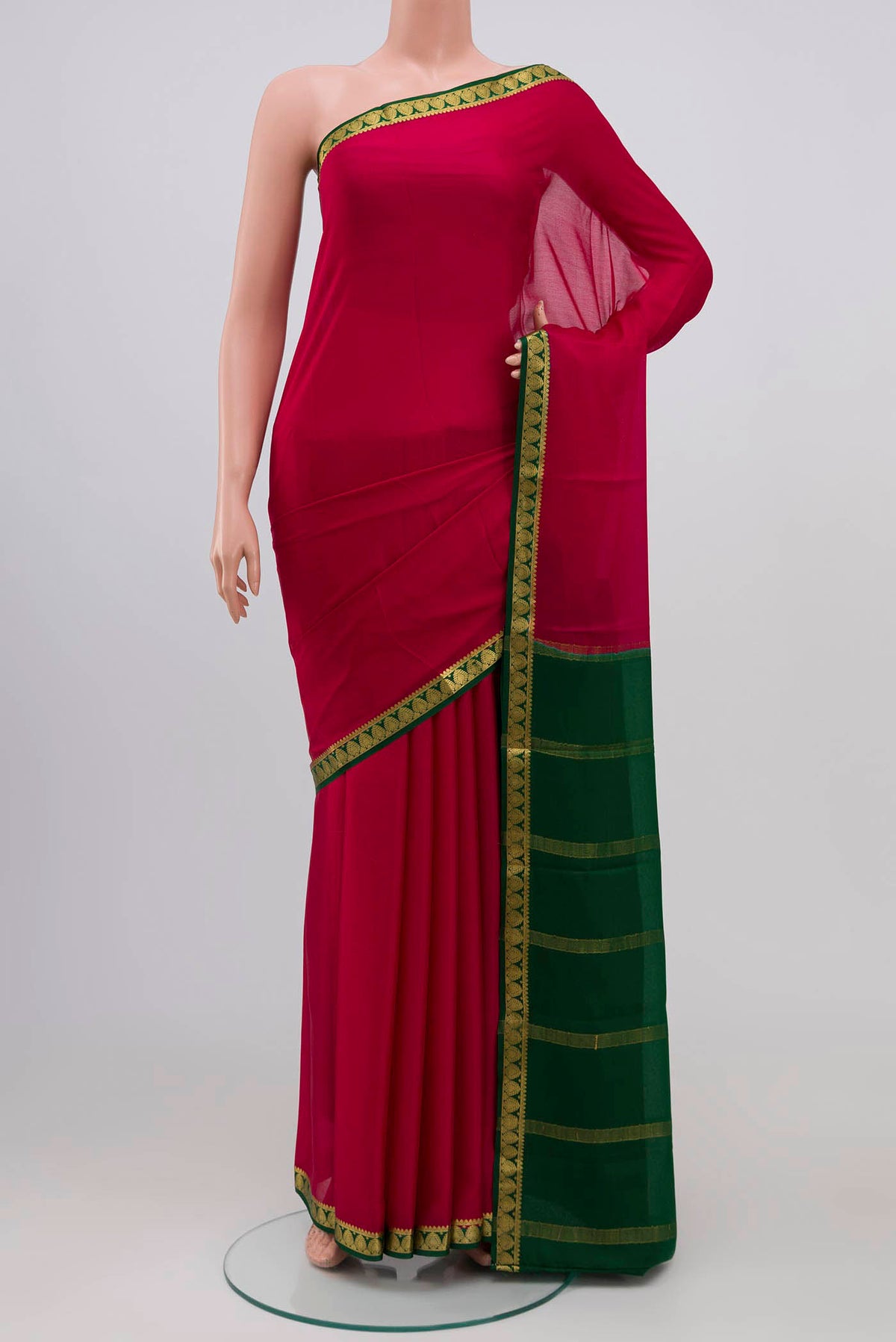 Maroon Mysore Crepe Saree with Plain Body and Zari Border.  displayed on a mannequin