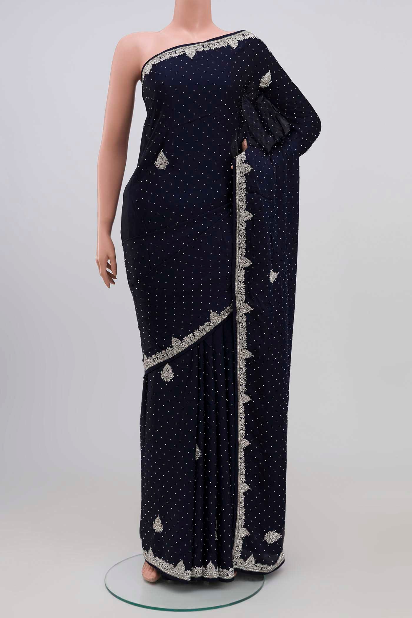 Navy Blue Blended Satin Silk Saree with Embroidery on the body and Fancy Border.  displayed on a mannequin