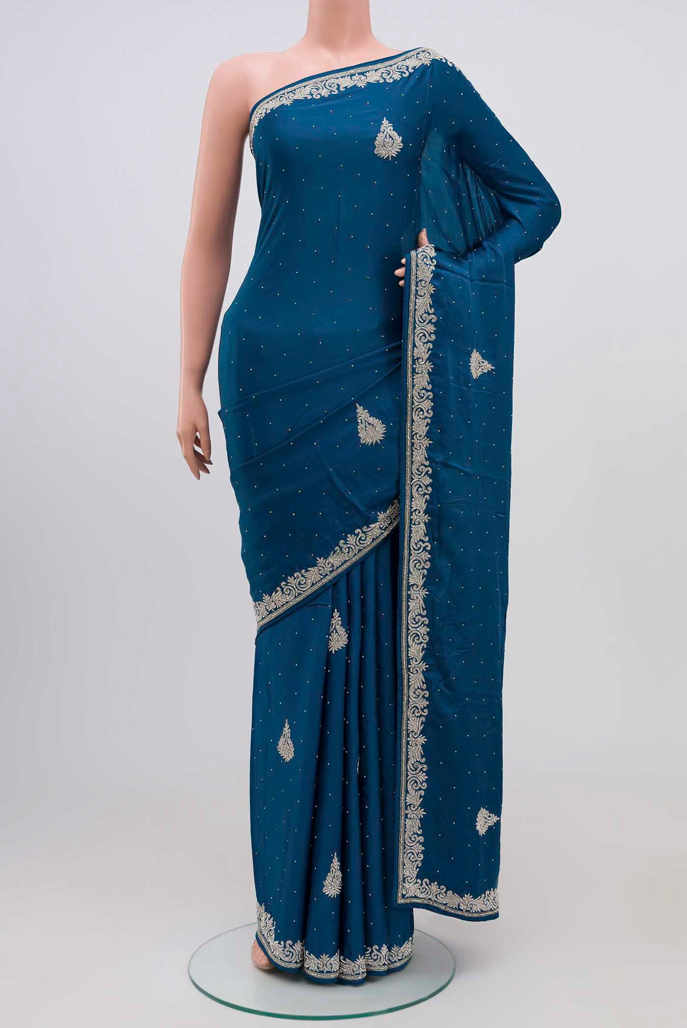 Blue Blended Satin Silk Saree with Embroidery on the body and Embroidery Border.  displayed on a mannequin