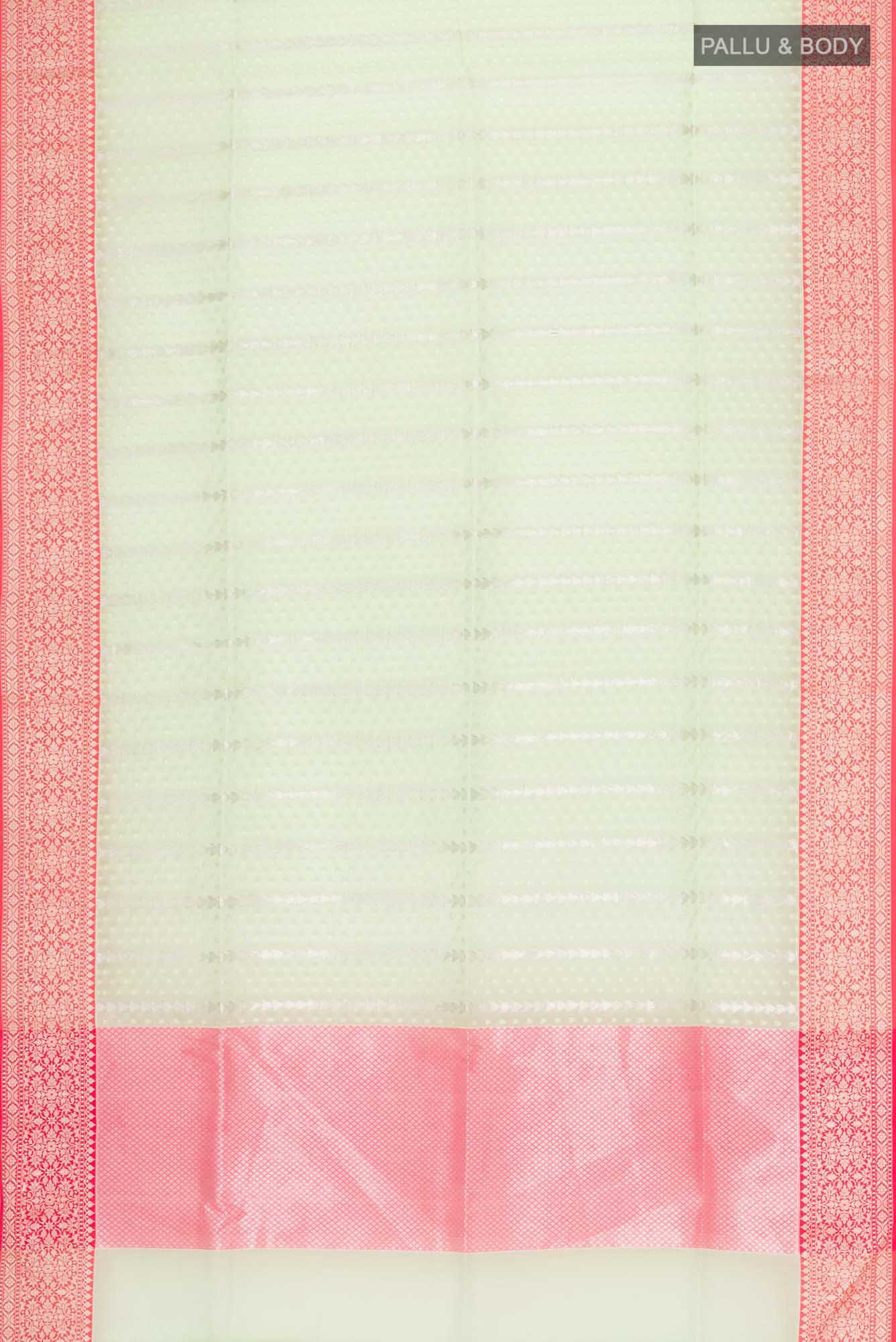 Flat view of Green Blended Kora Cotton Saree with Zari Butta on the body and Zari Border. 